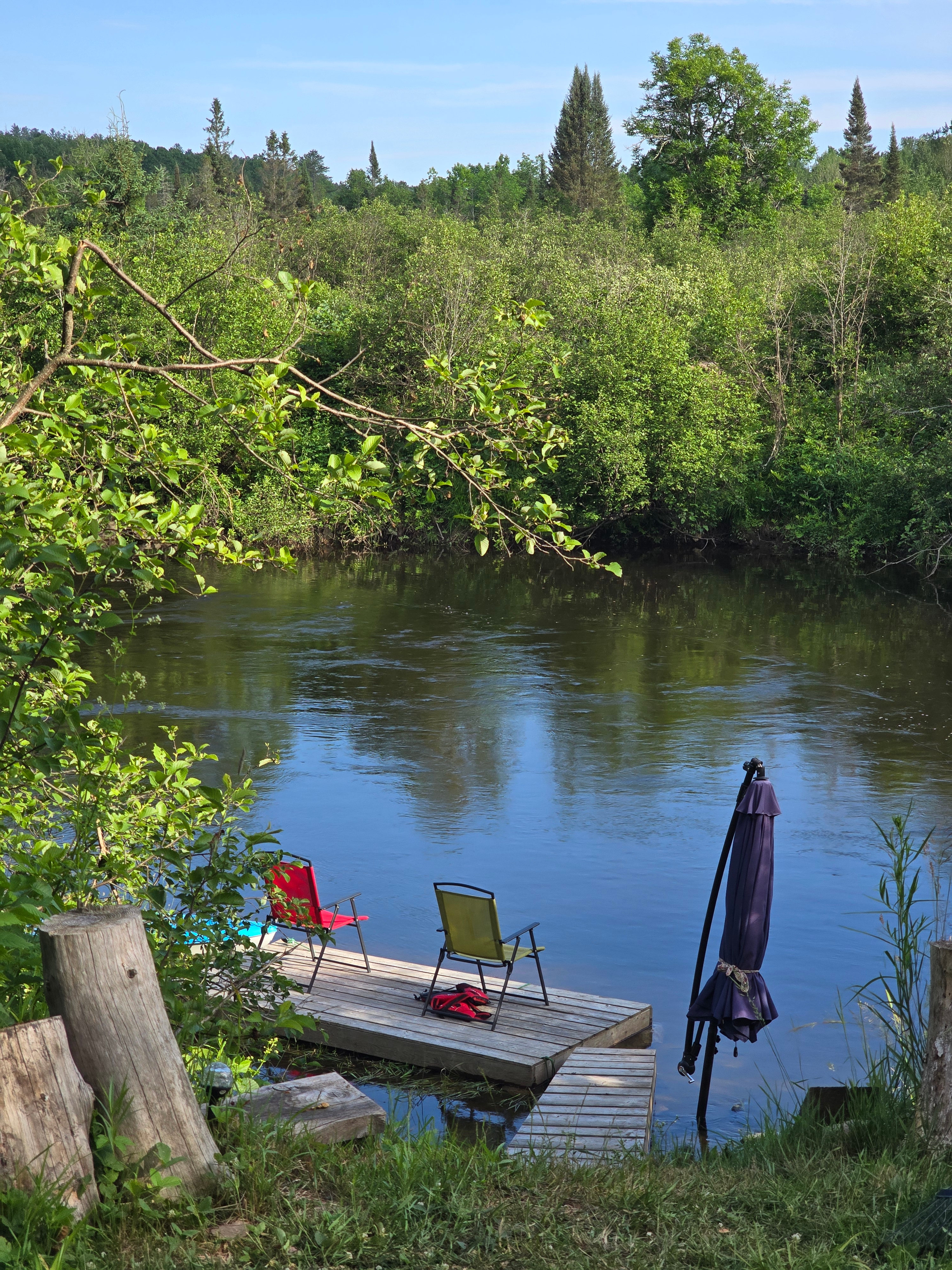 Have a seat by the river and listen to it flow.
