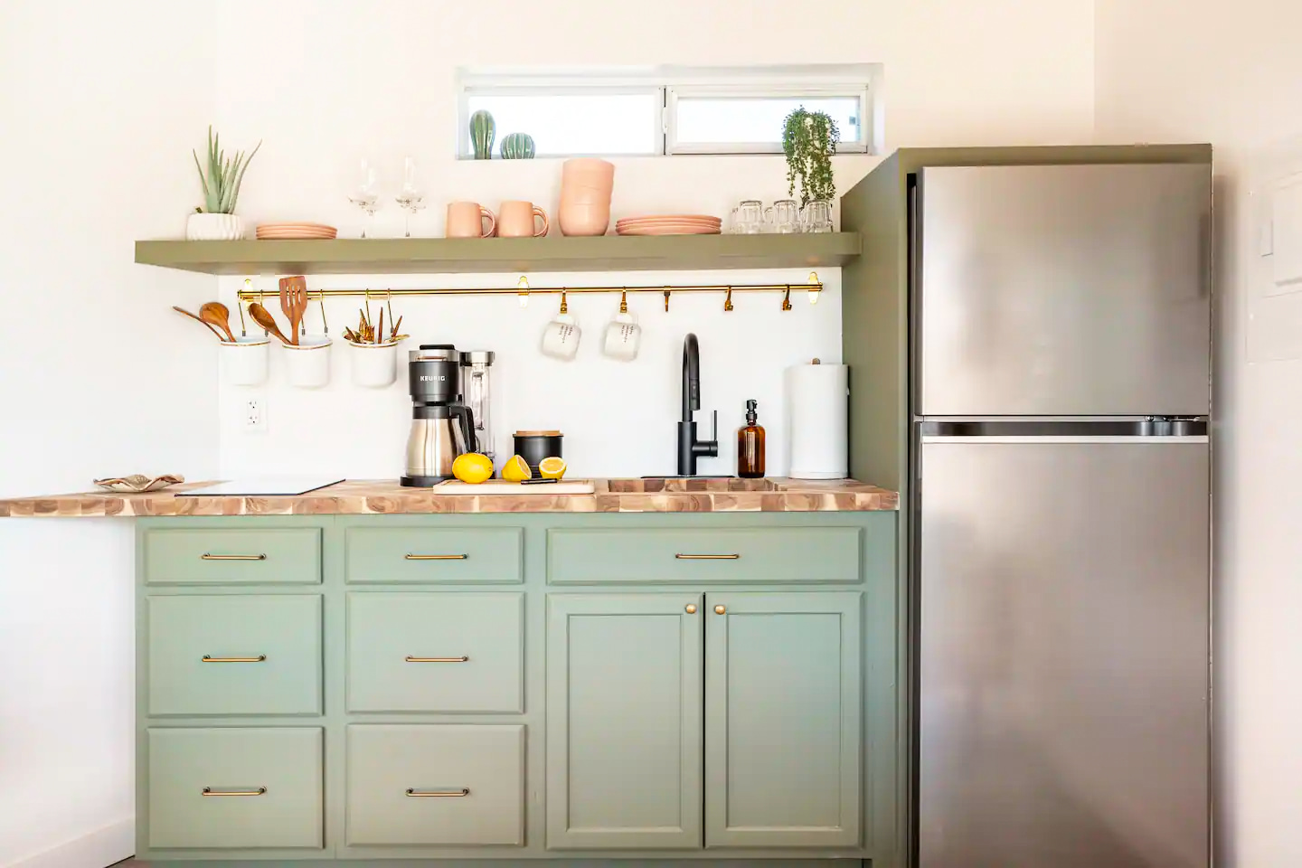 The kitechnette includes a fridge and freezer, kitchen sink two burner electric cook top, pots & pans, coffee maker and coffee bar, dishes and basic seasonings.