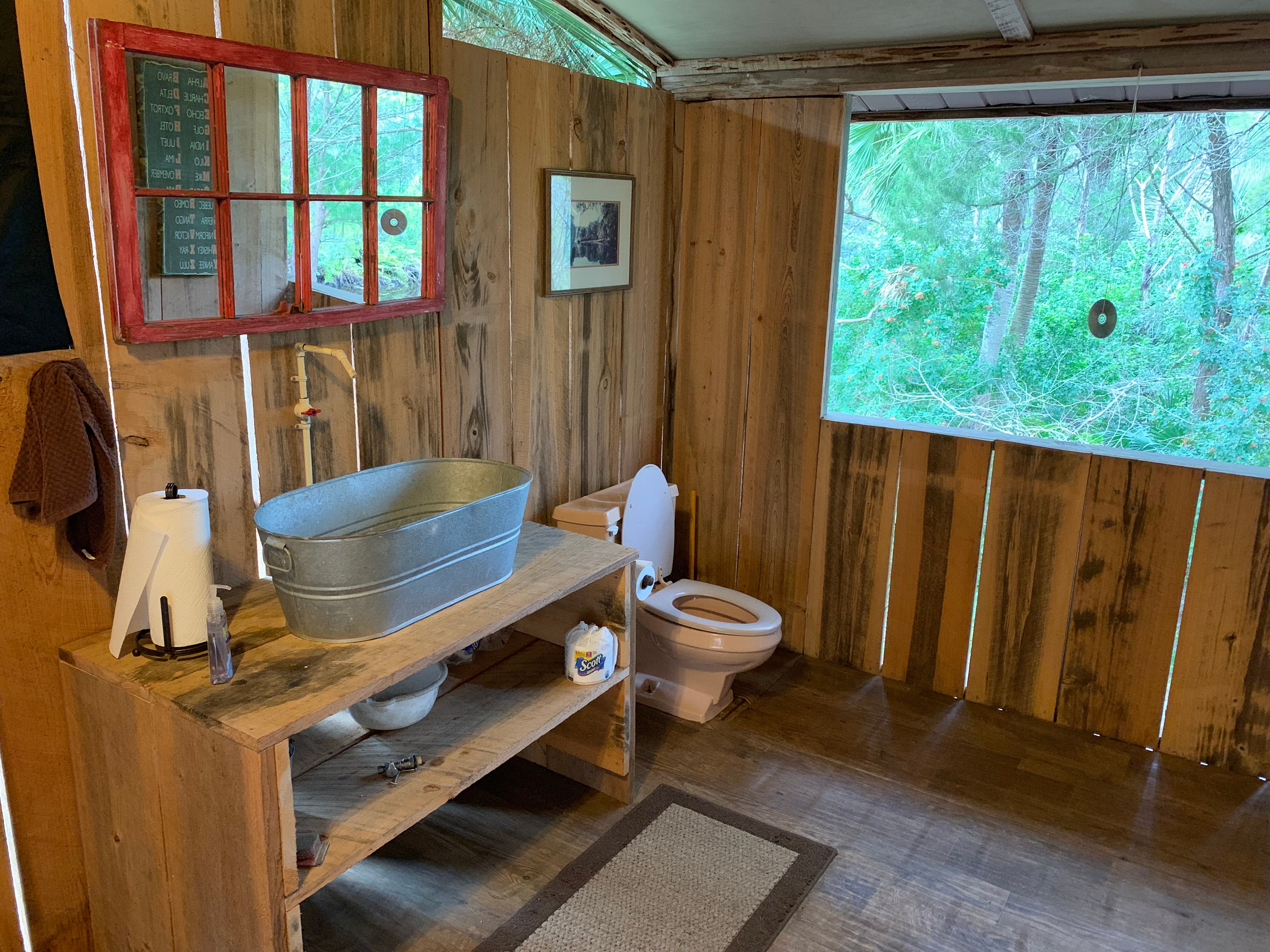 Outdoor bathroom on second floor