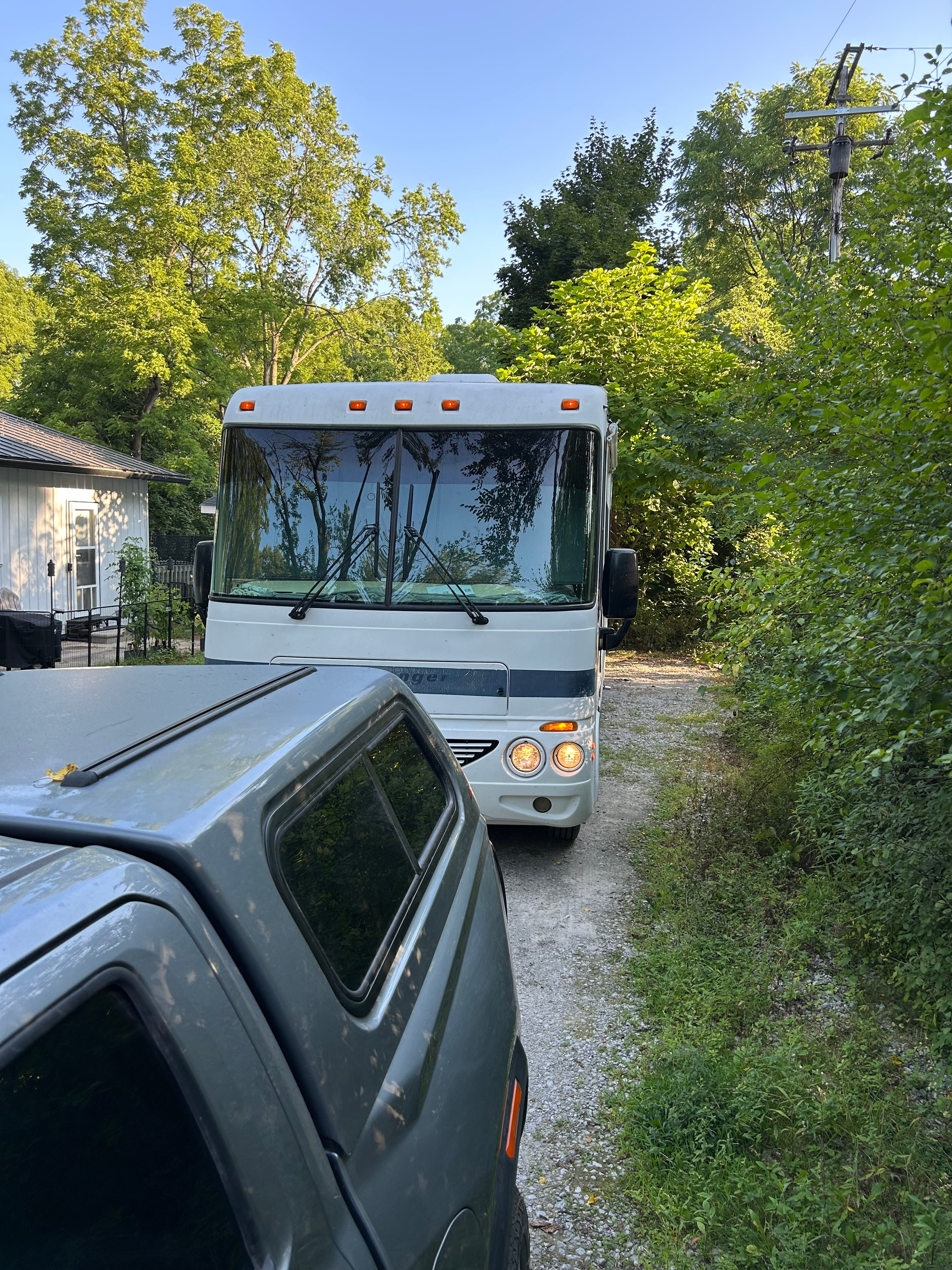 Our car and RV in the driveway