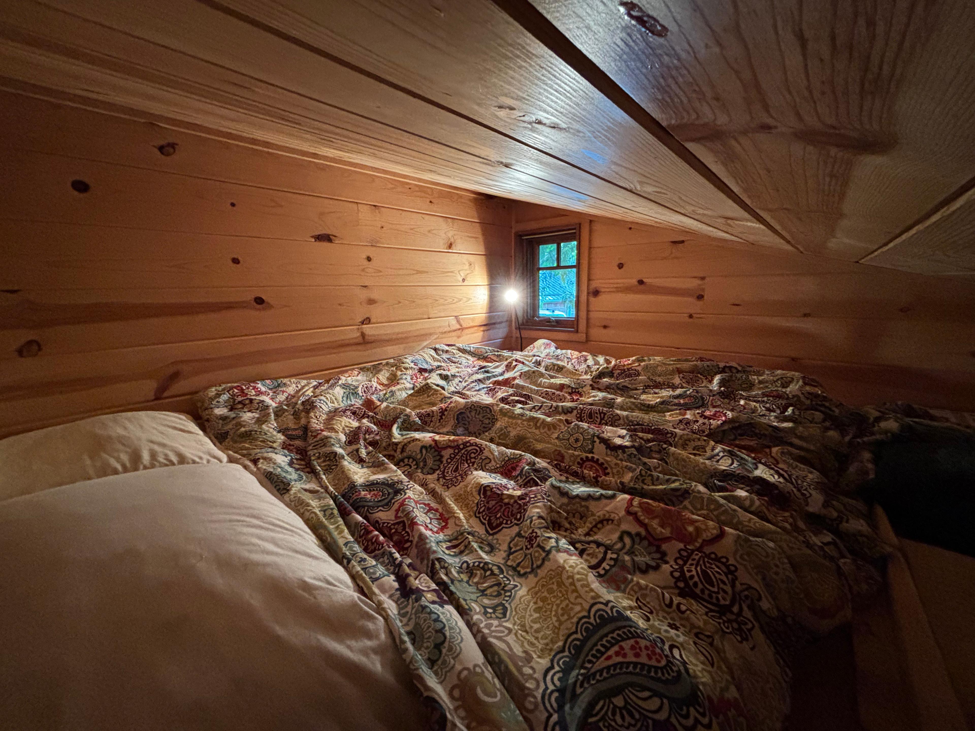 Queen bed in loft.