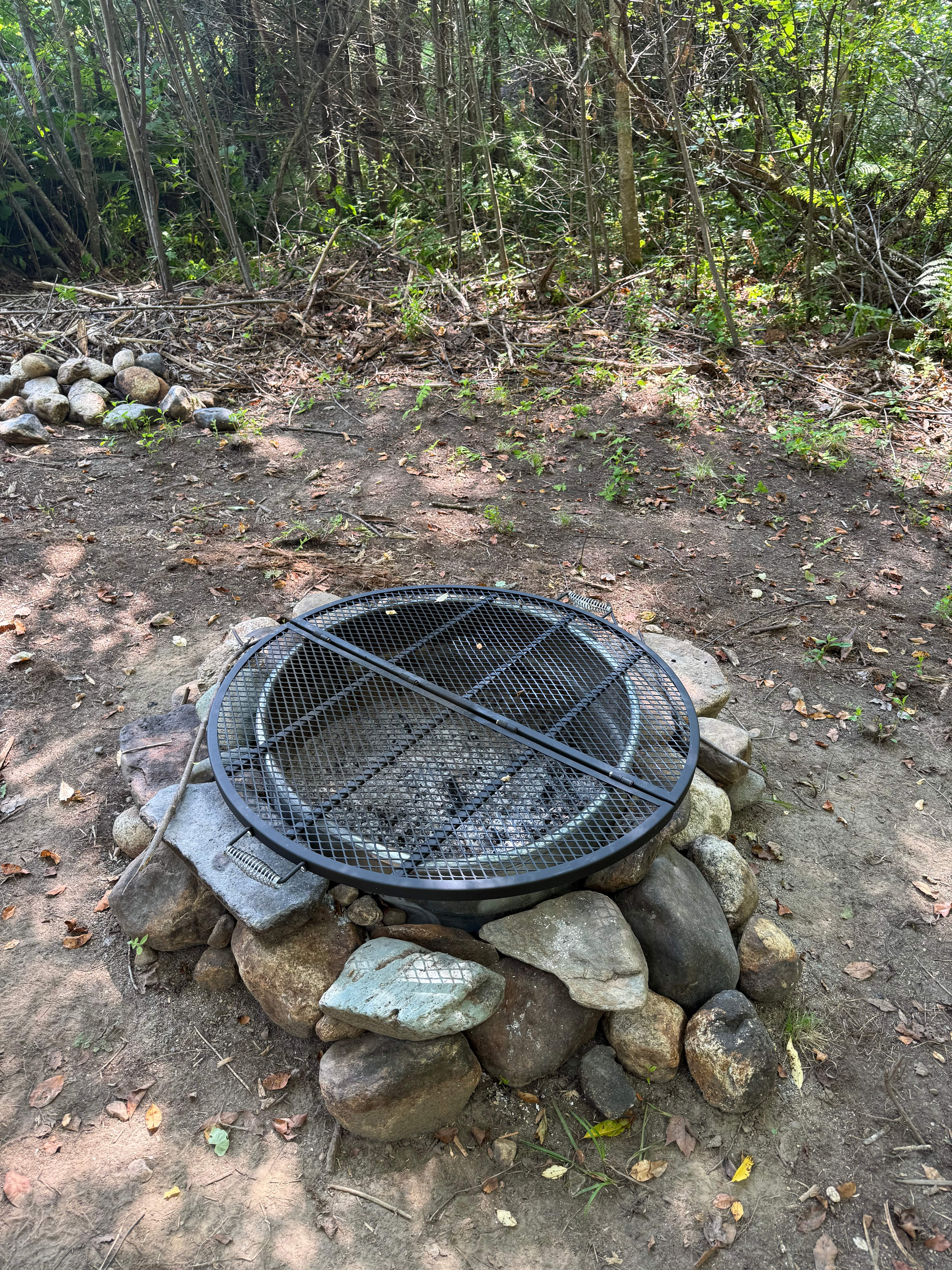The firepit does not disappoint.  The grill folds in half for easy access.  Firewood is available from down, dead wood, or bring your own.