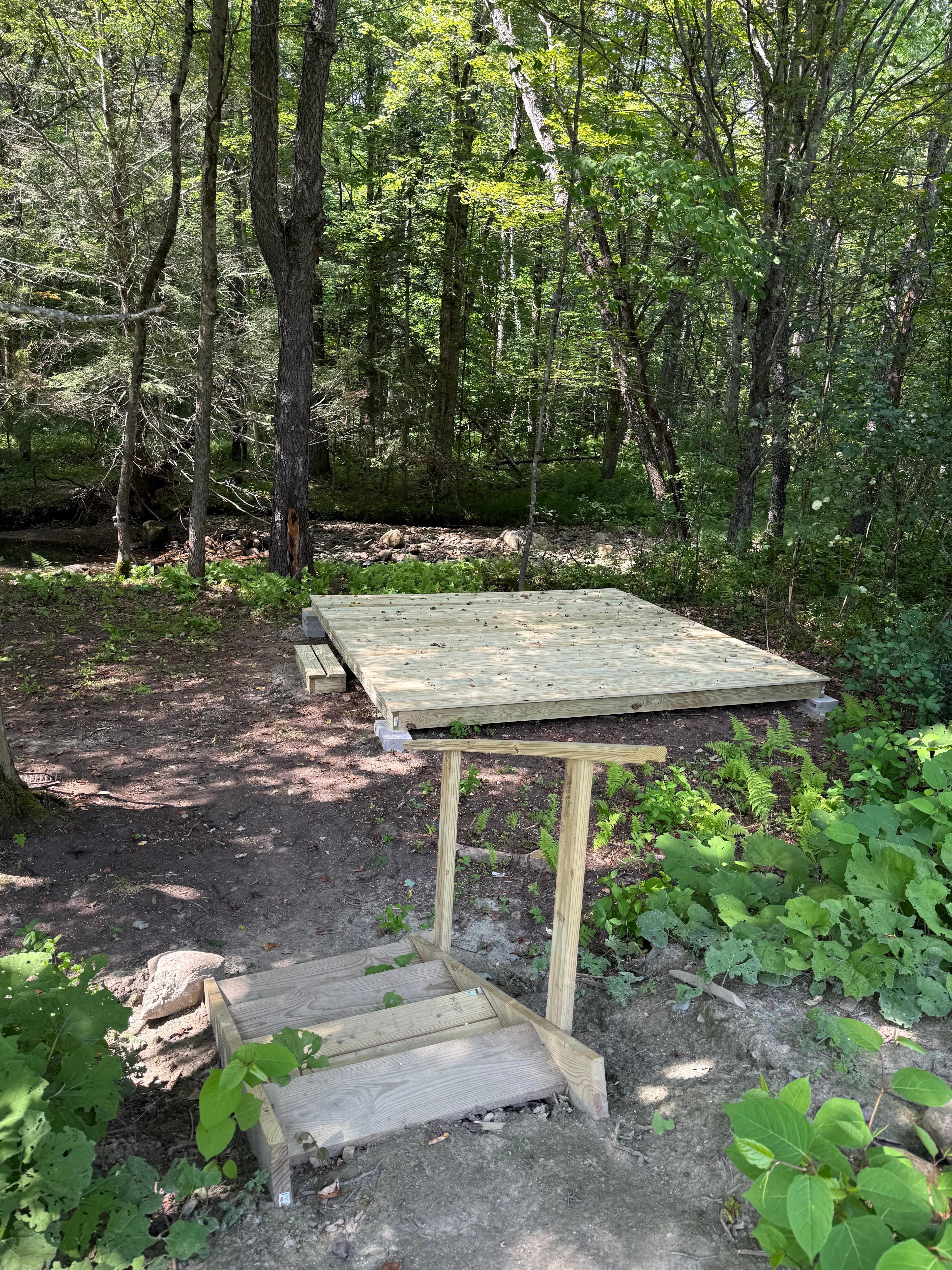 Stairs leading from the upper parking area to the 12'X12' tent platform
