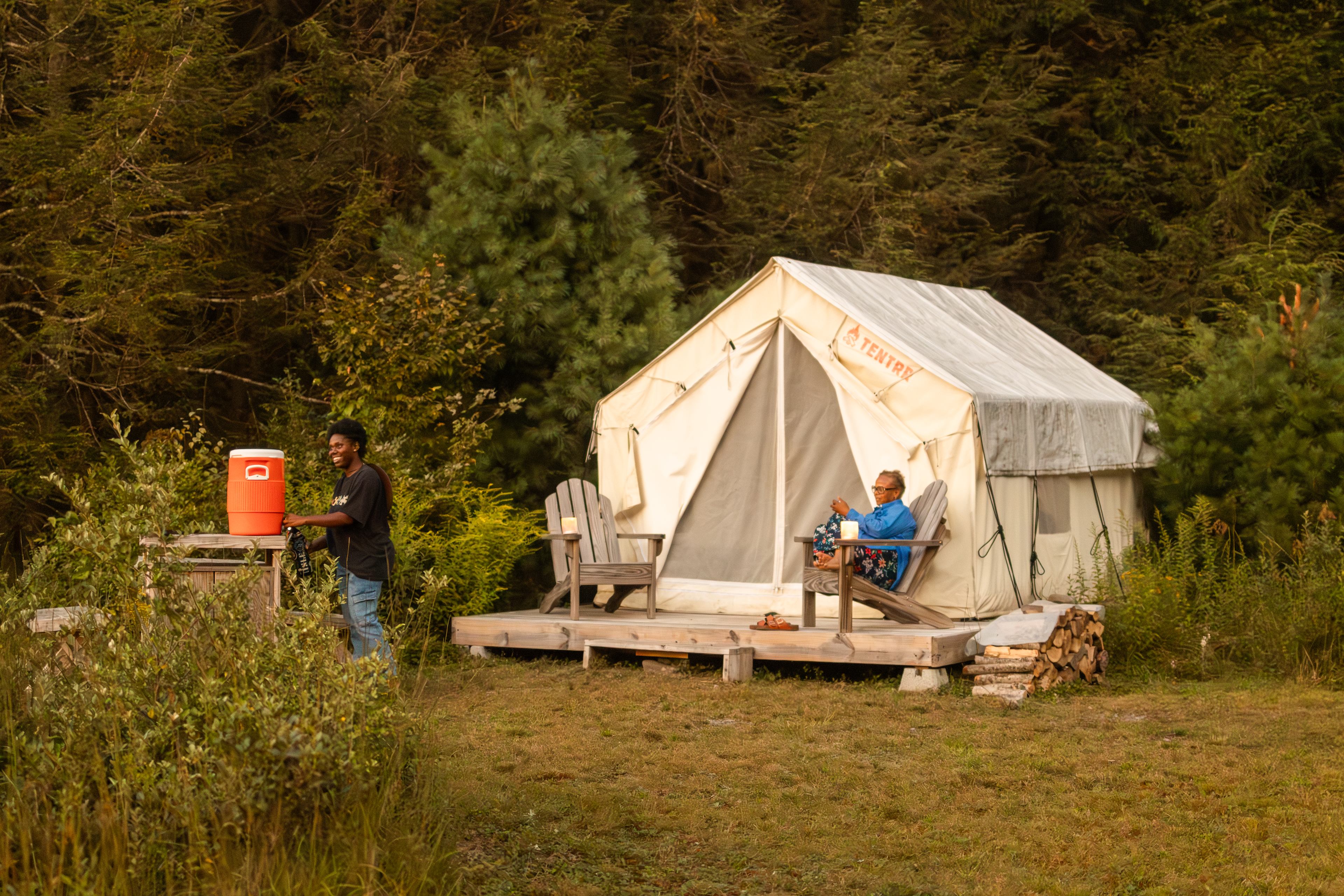 An evening at camp filling up water from the jug Mark left on our table.