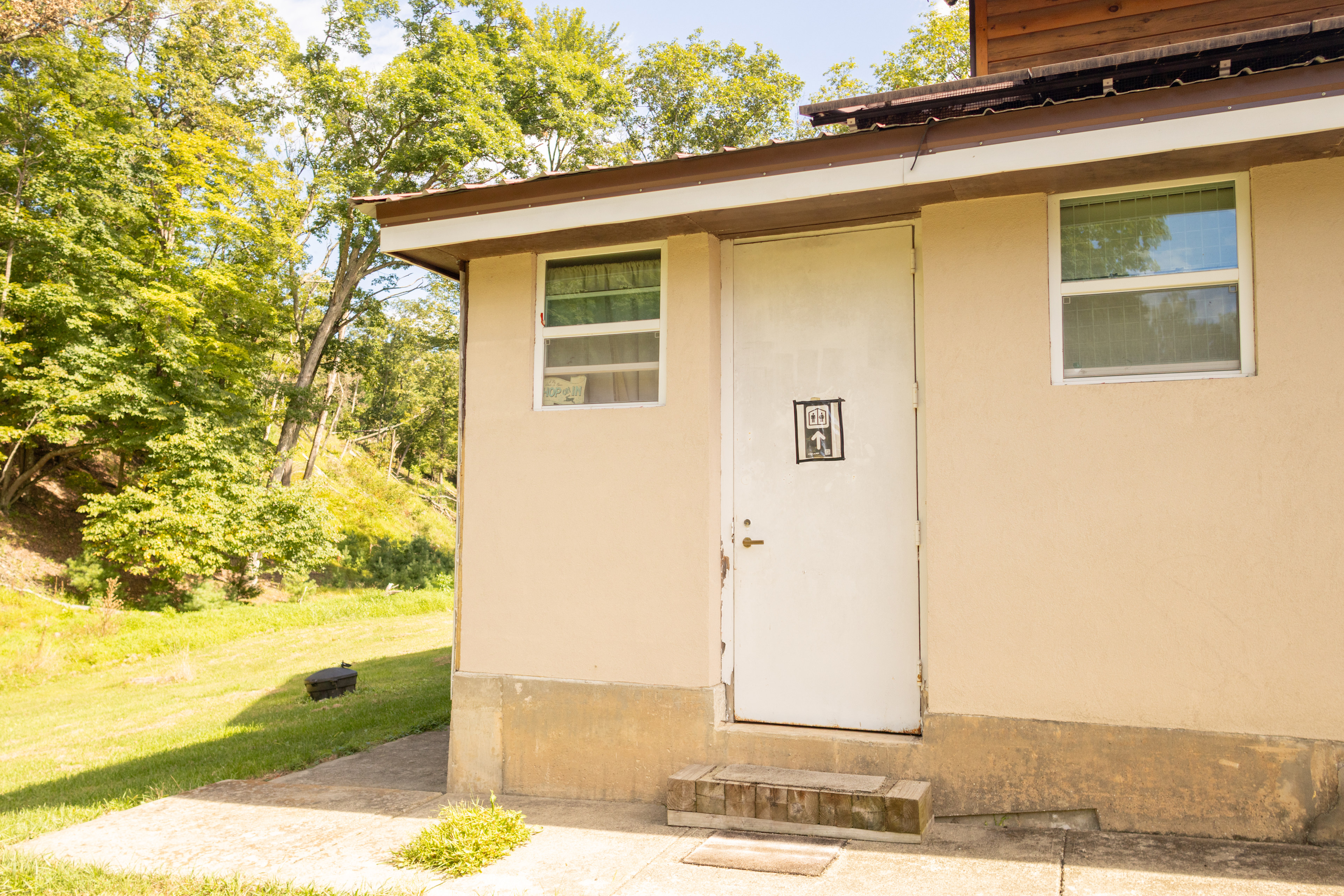 The full bathroom is on the back end of Howards house.