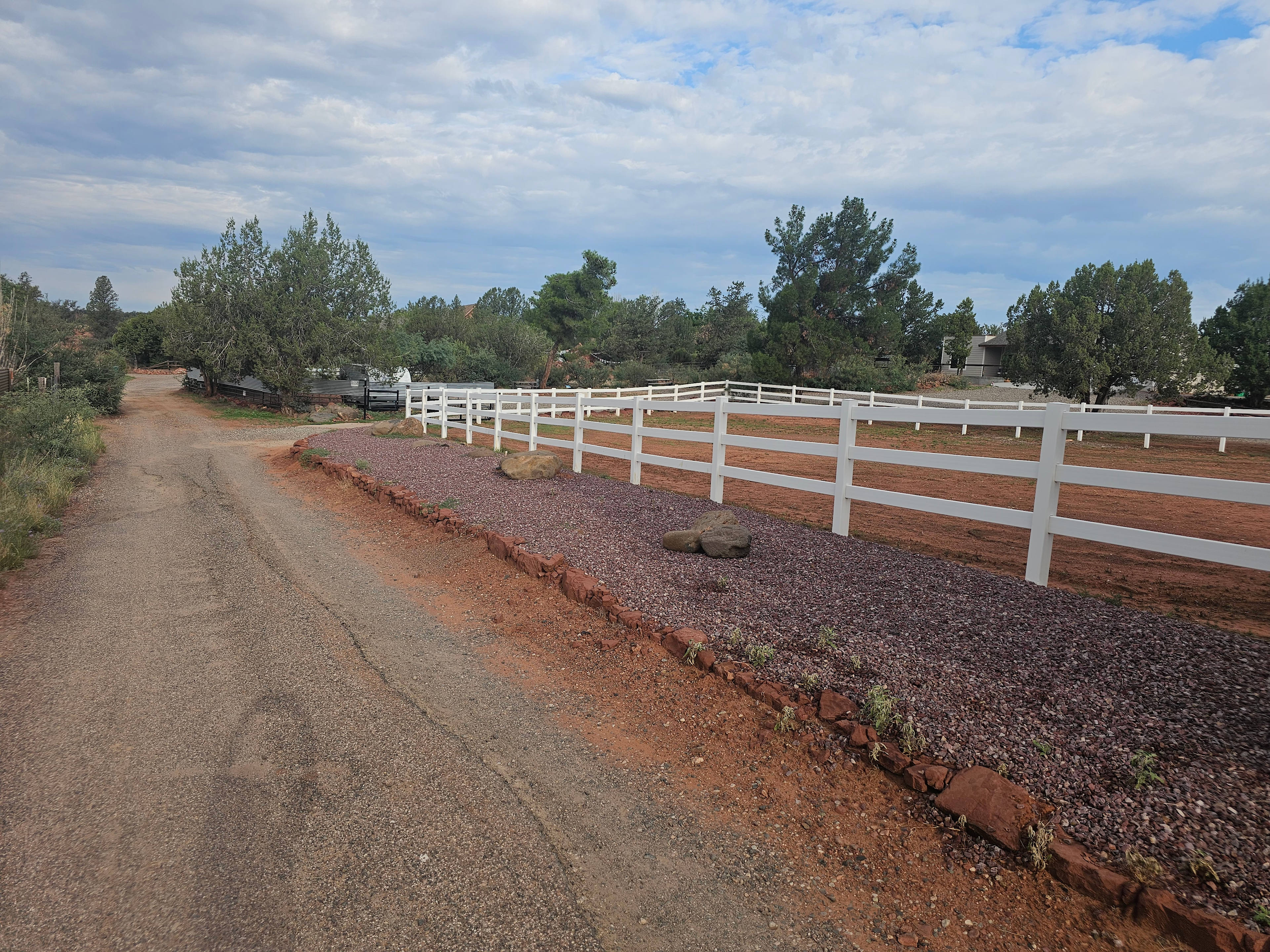 Entrance on the right after a fence