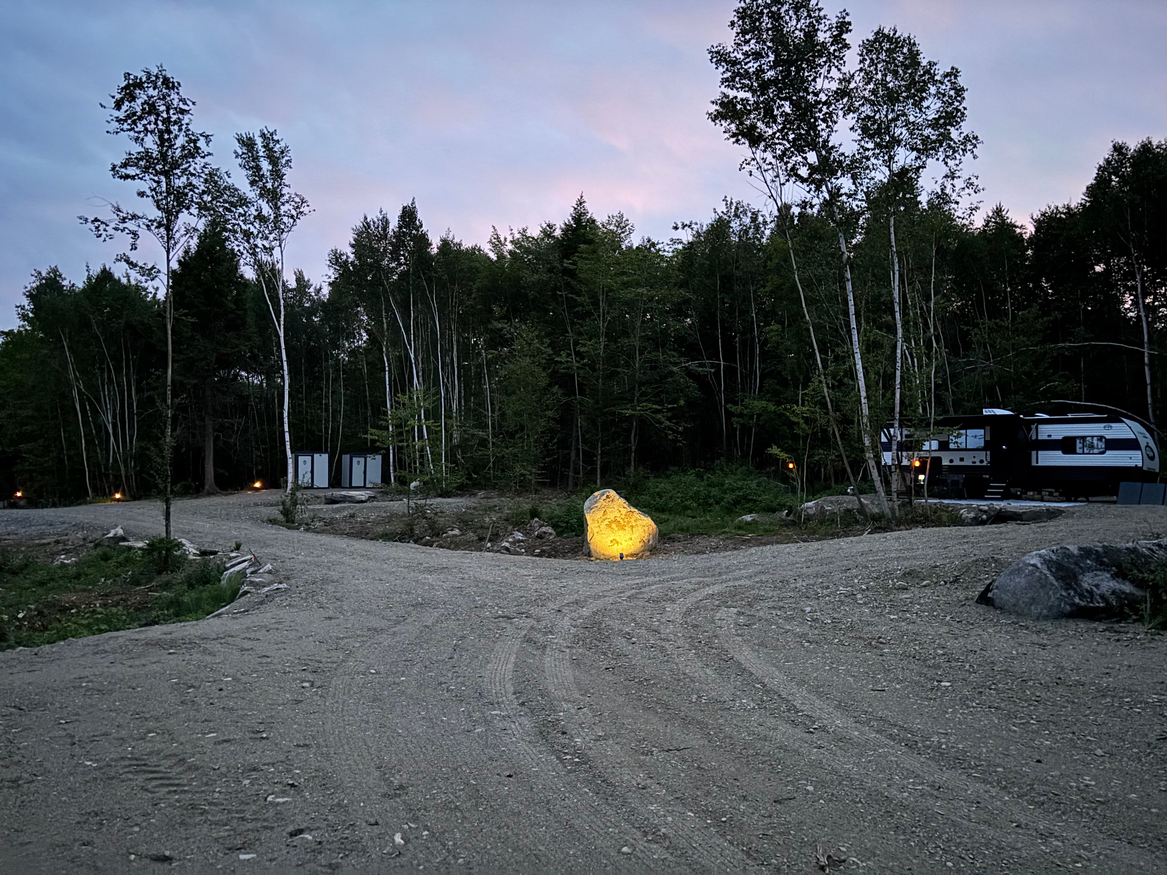 The rv is also rented out.  The tent site is down the left side.