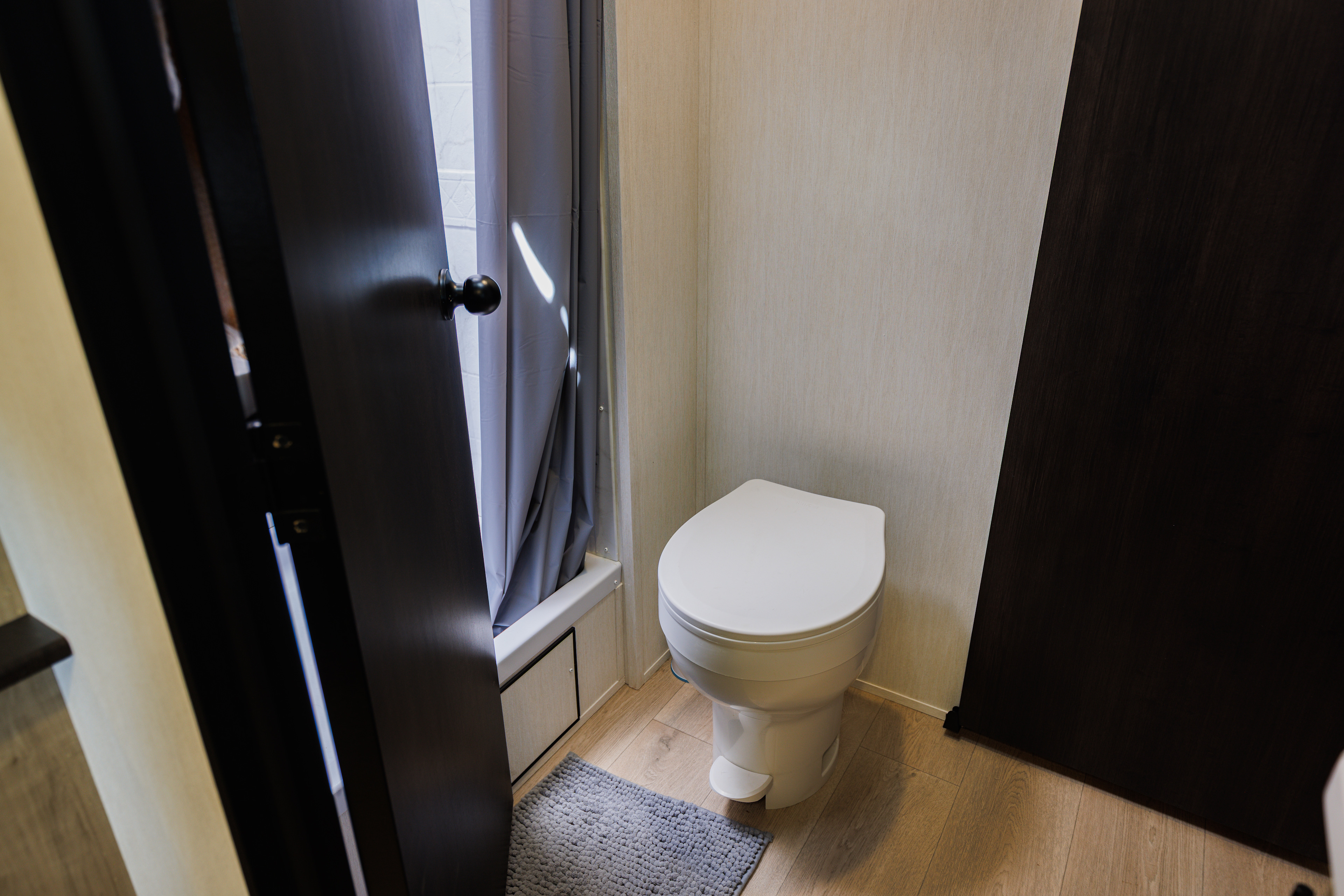 Toilet, sink, and shower.