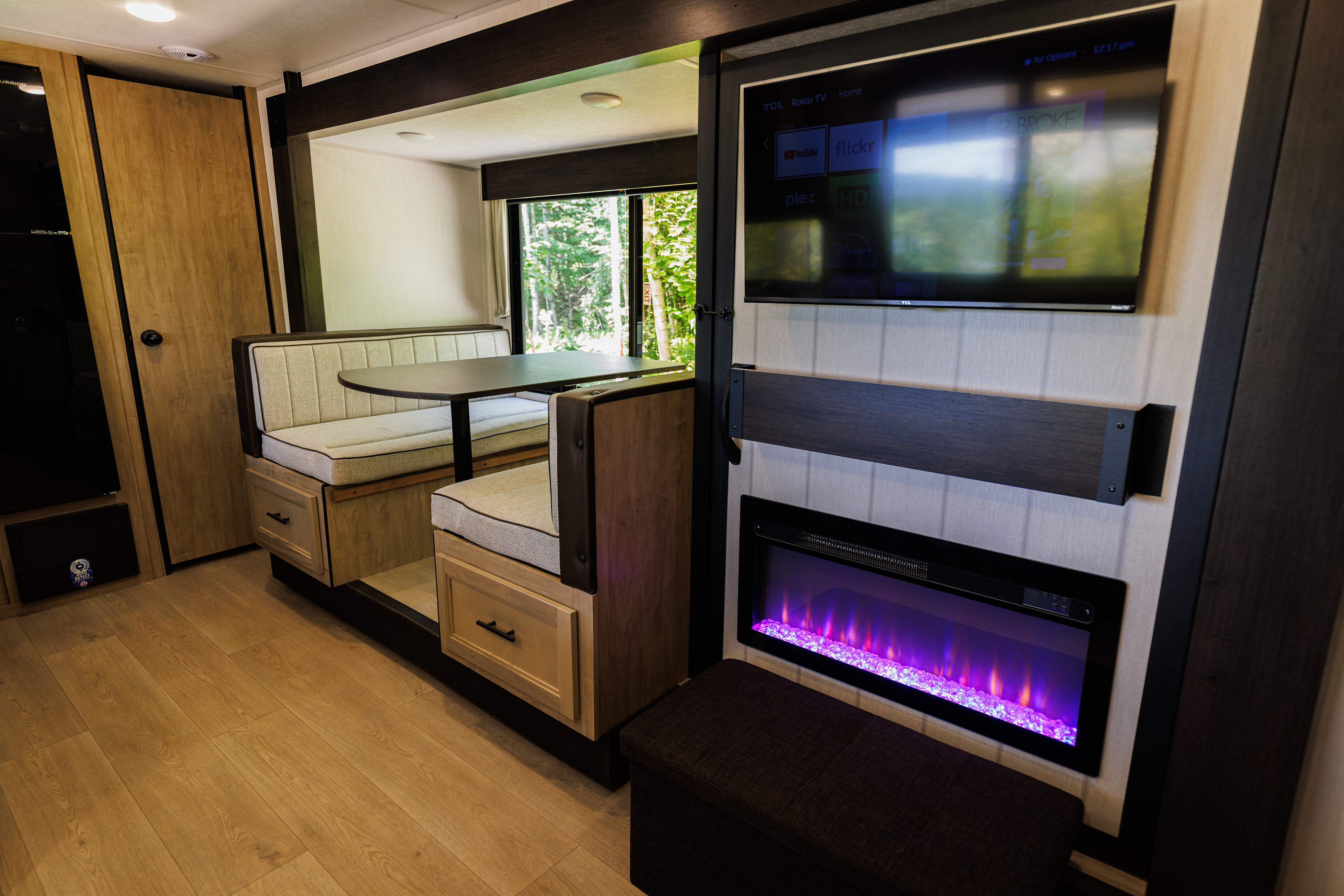 Dining area and second full-size bed.  TV with streaming services and electric fireplace.