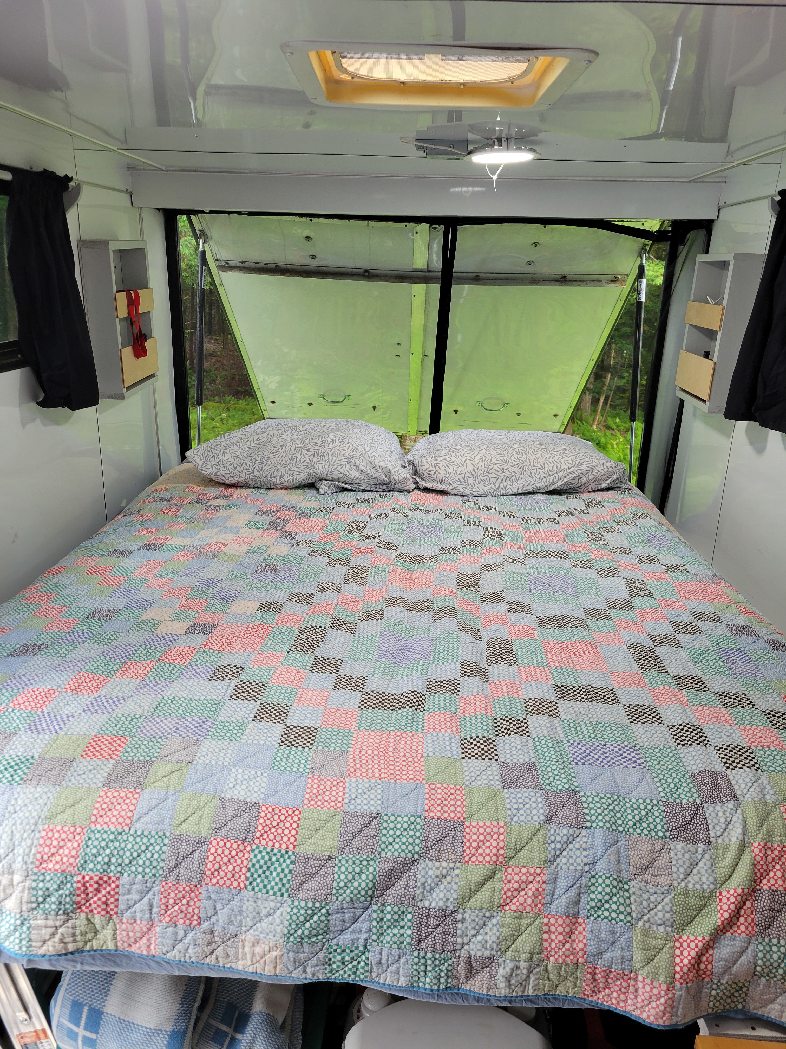 Queen bed with rear canopy open
