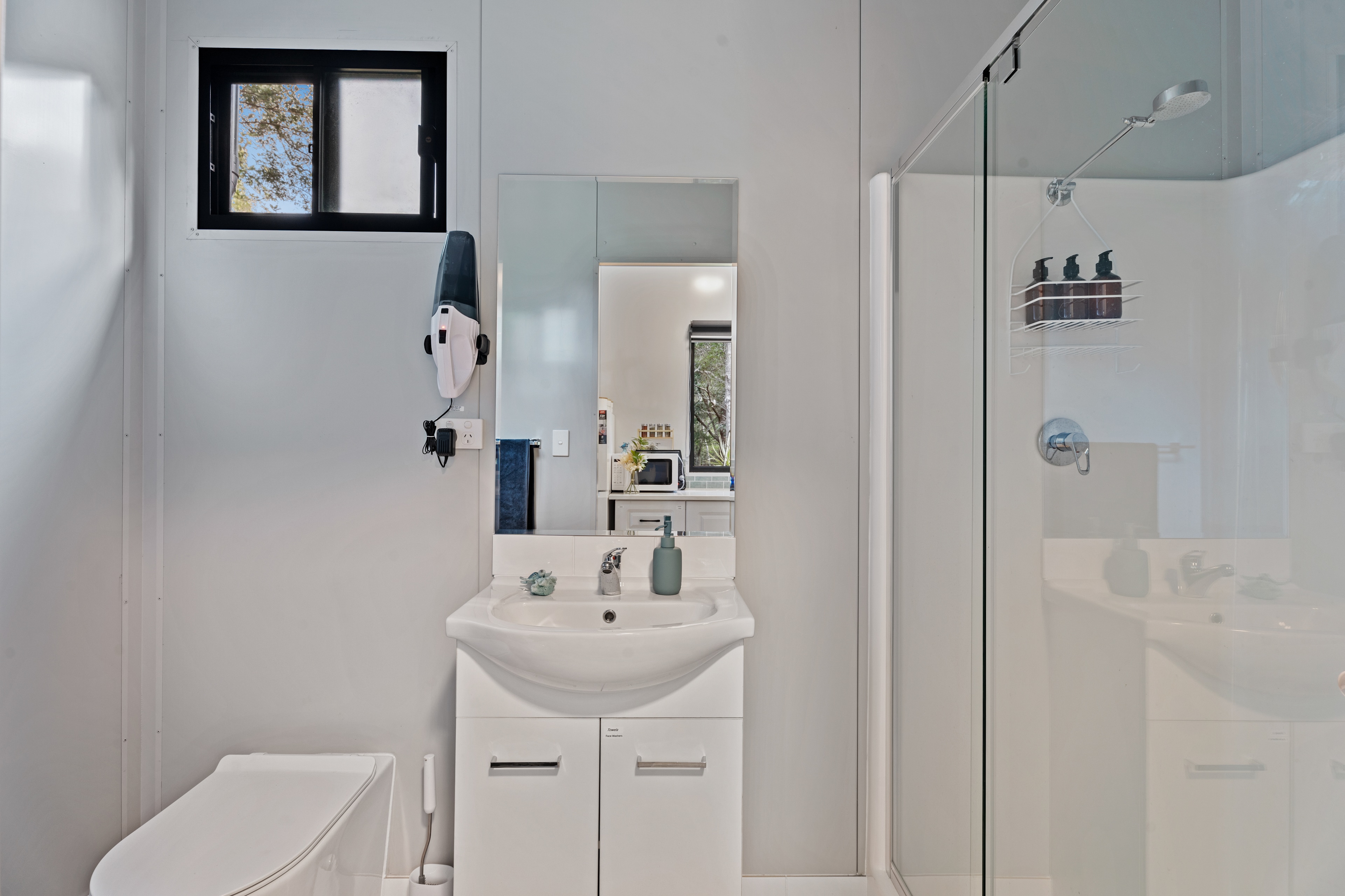 Bathroom with decent size shower and Eco green toilet. Towels, shampoo, conditioner, bodywash provided. 