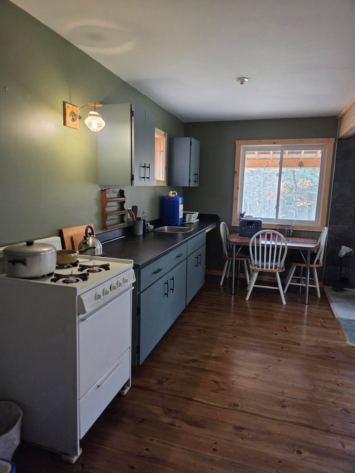 For washing up/doing dishes, I provide each guest (left at the cabin prior to check-in), with x3 five gallon jugs full of tap water for general use. 