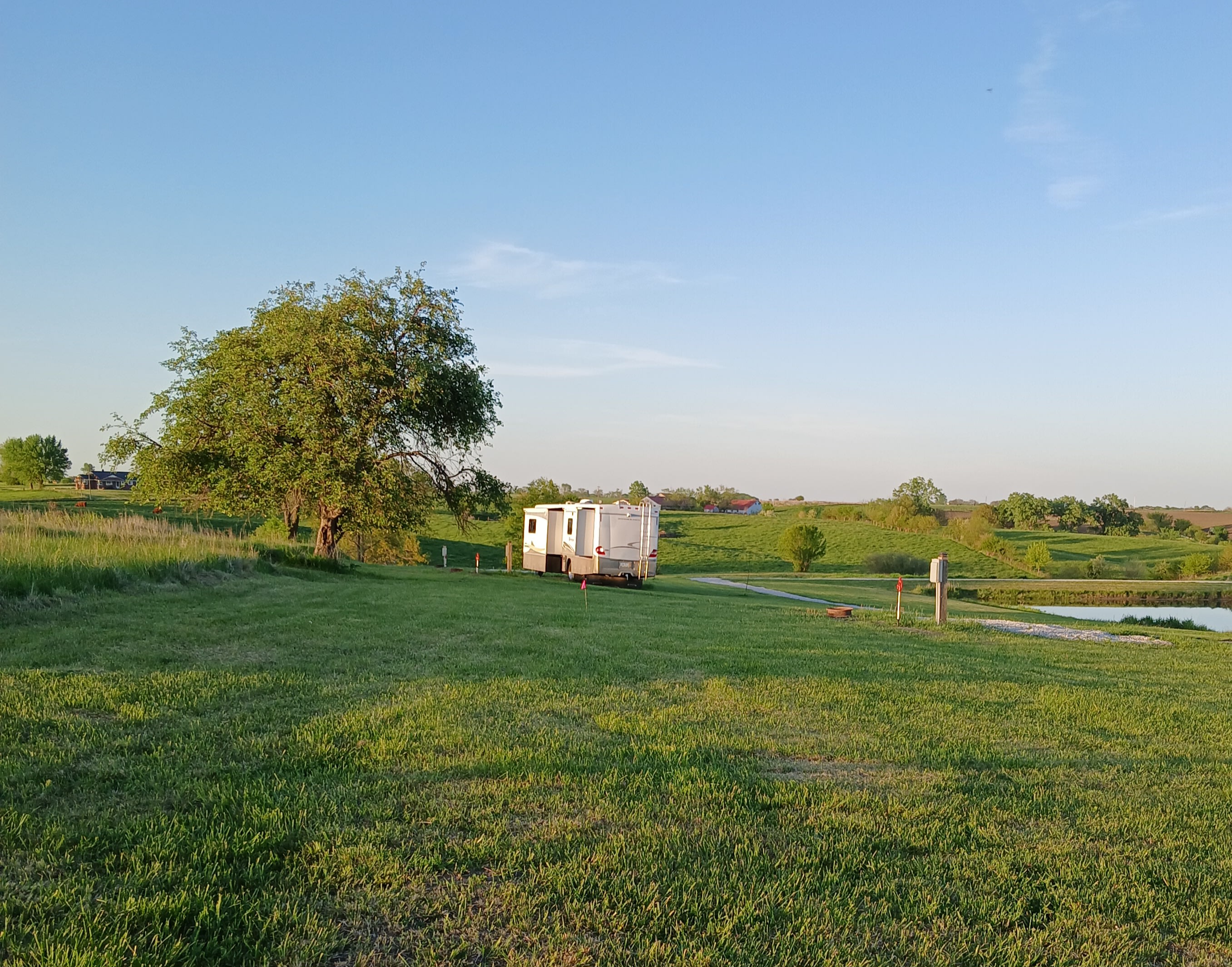Site 3 is furthest in the background, past site 2 with RV parked in it.
