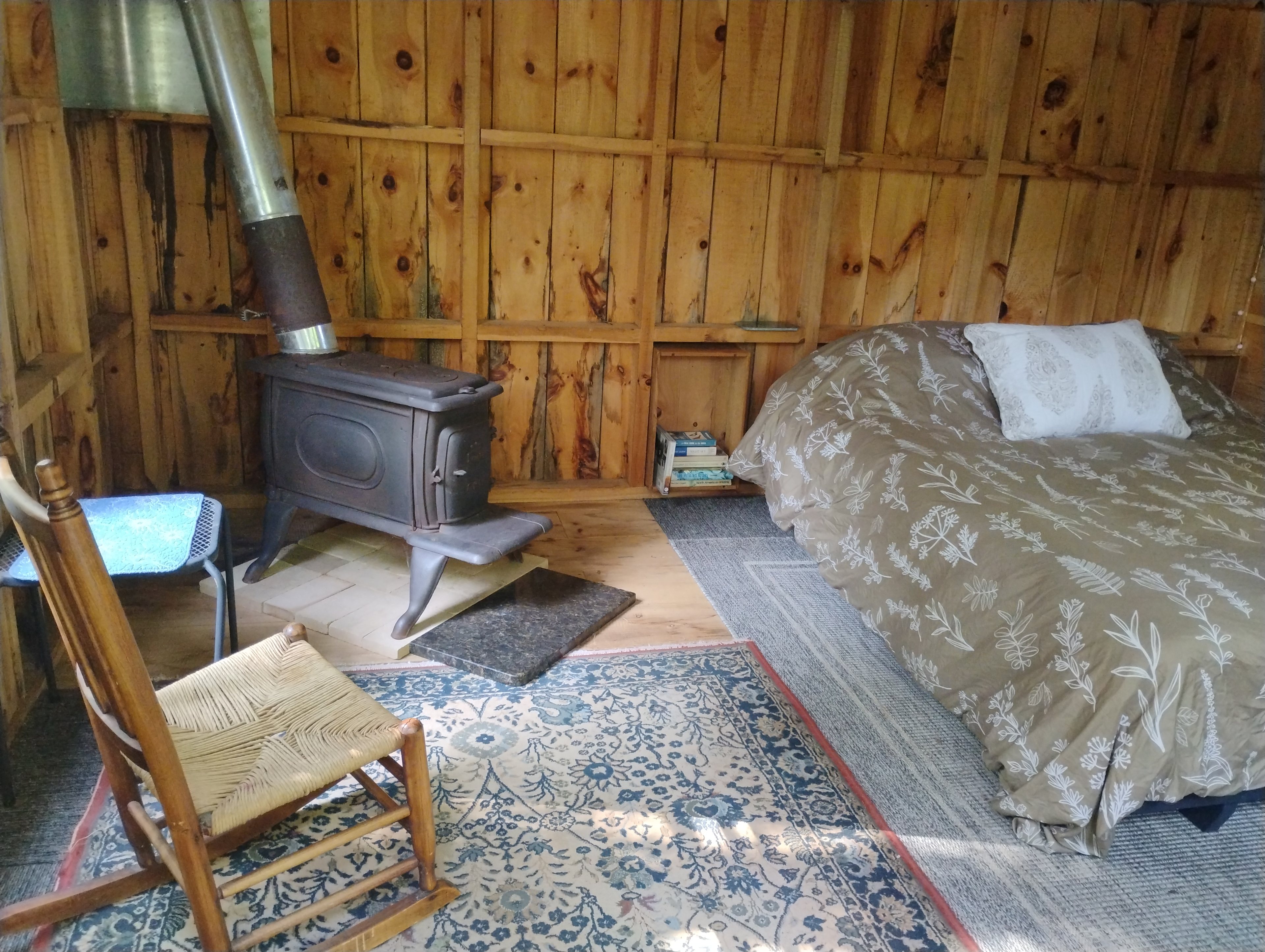 Guests remark on the quality of sleep they experience in the cozy off-grid cabin that was made from pines that once stood on-site.