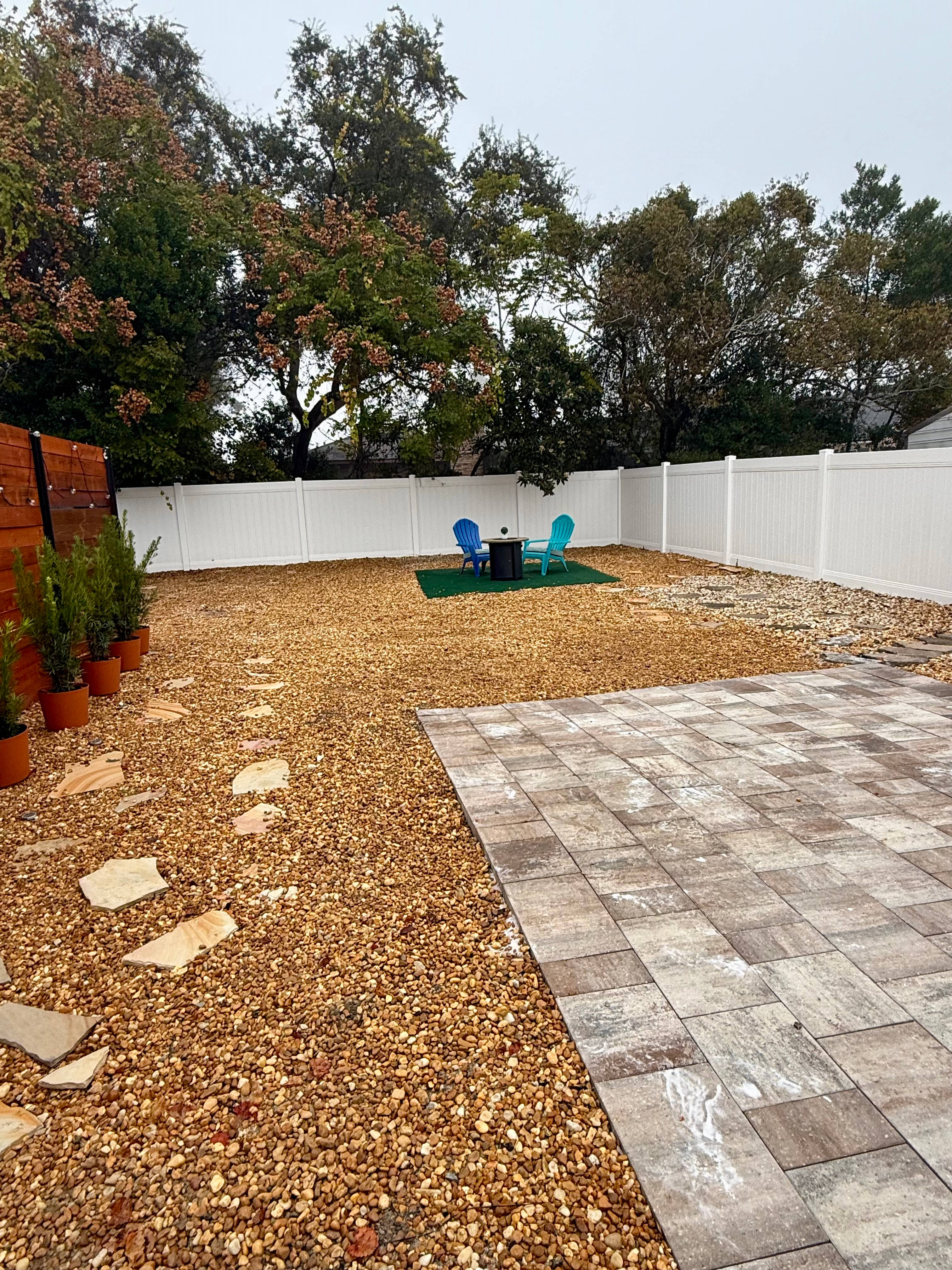 Rv can be parked right on the pavers down to the green pad underneath the pad is concrete. 