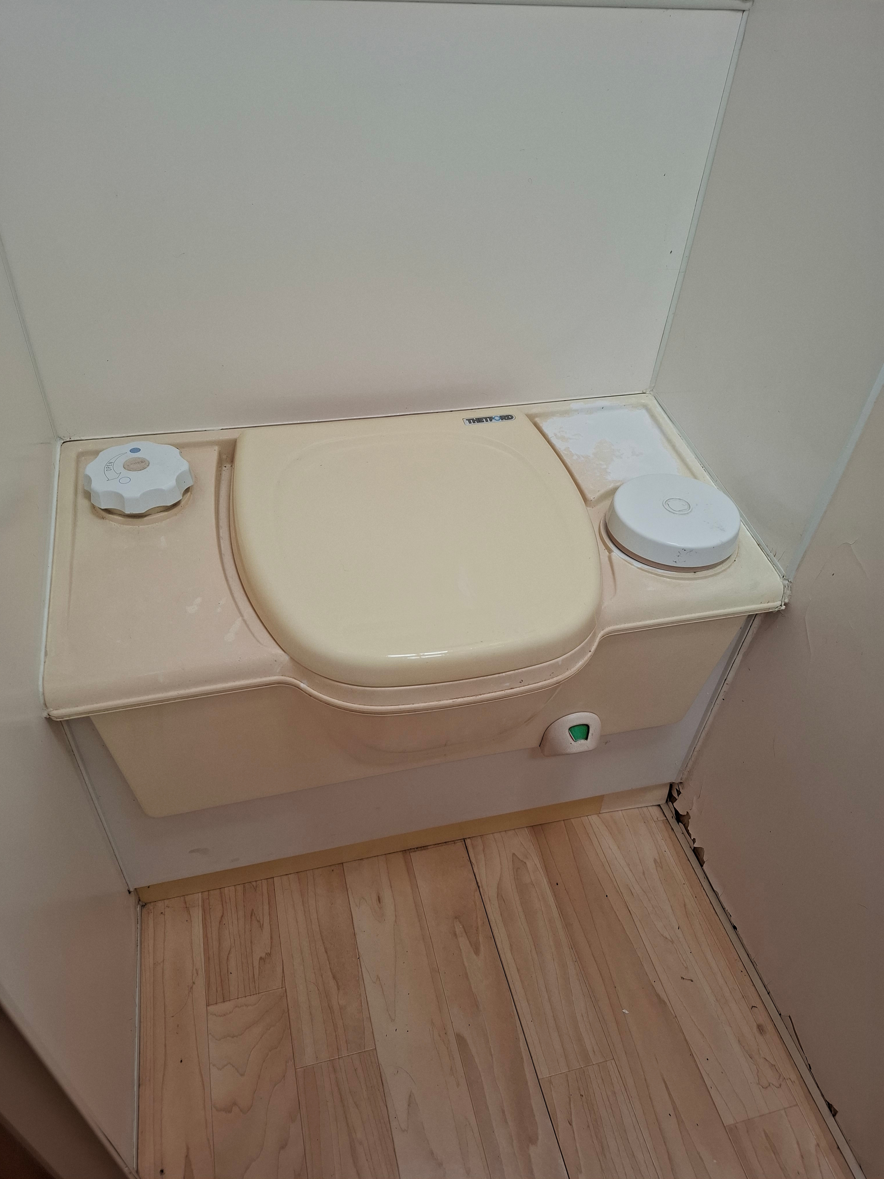 Large camp toilet, flushable, on suite to main bedroom