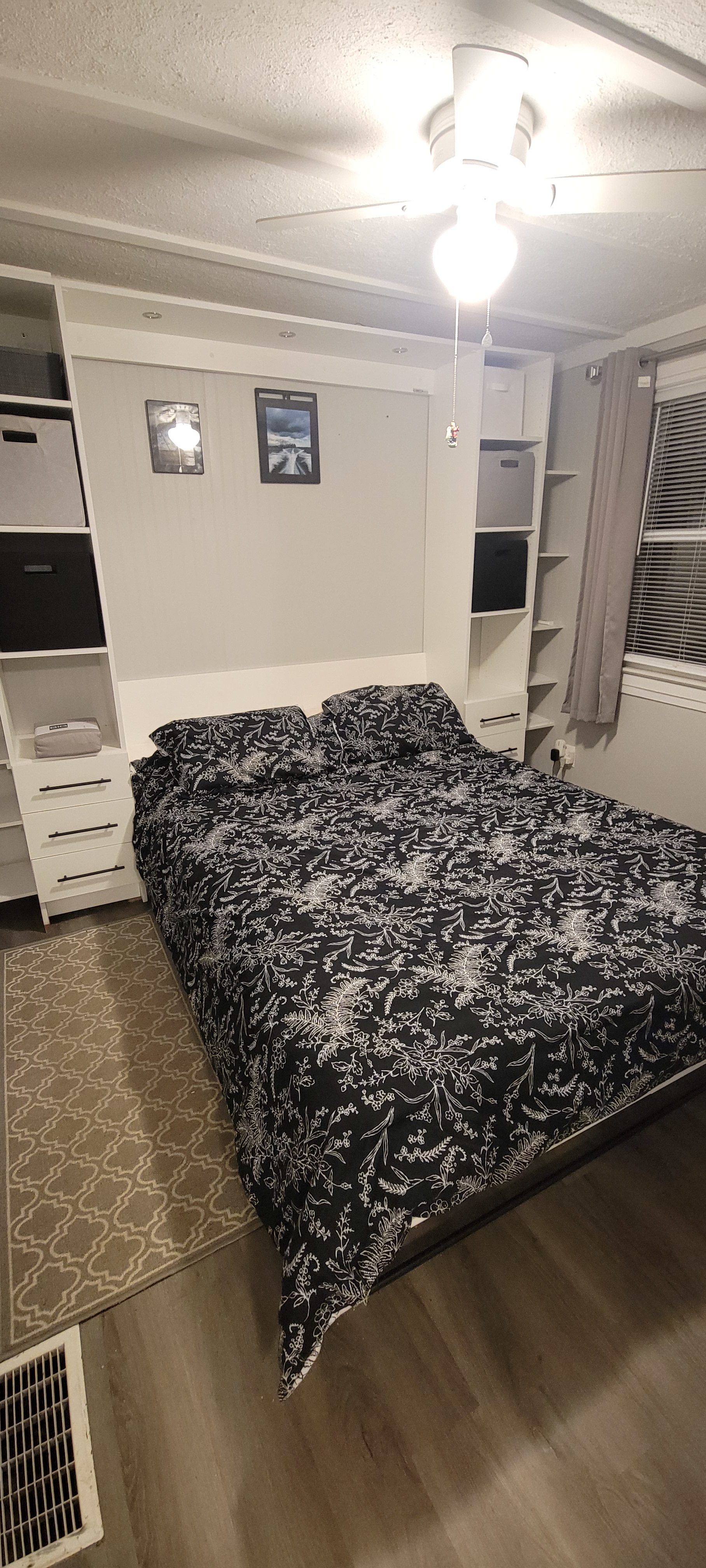 Queen size bed and lots of shelves, drawers for your convenience. 