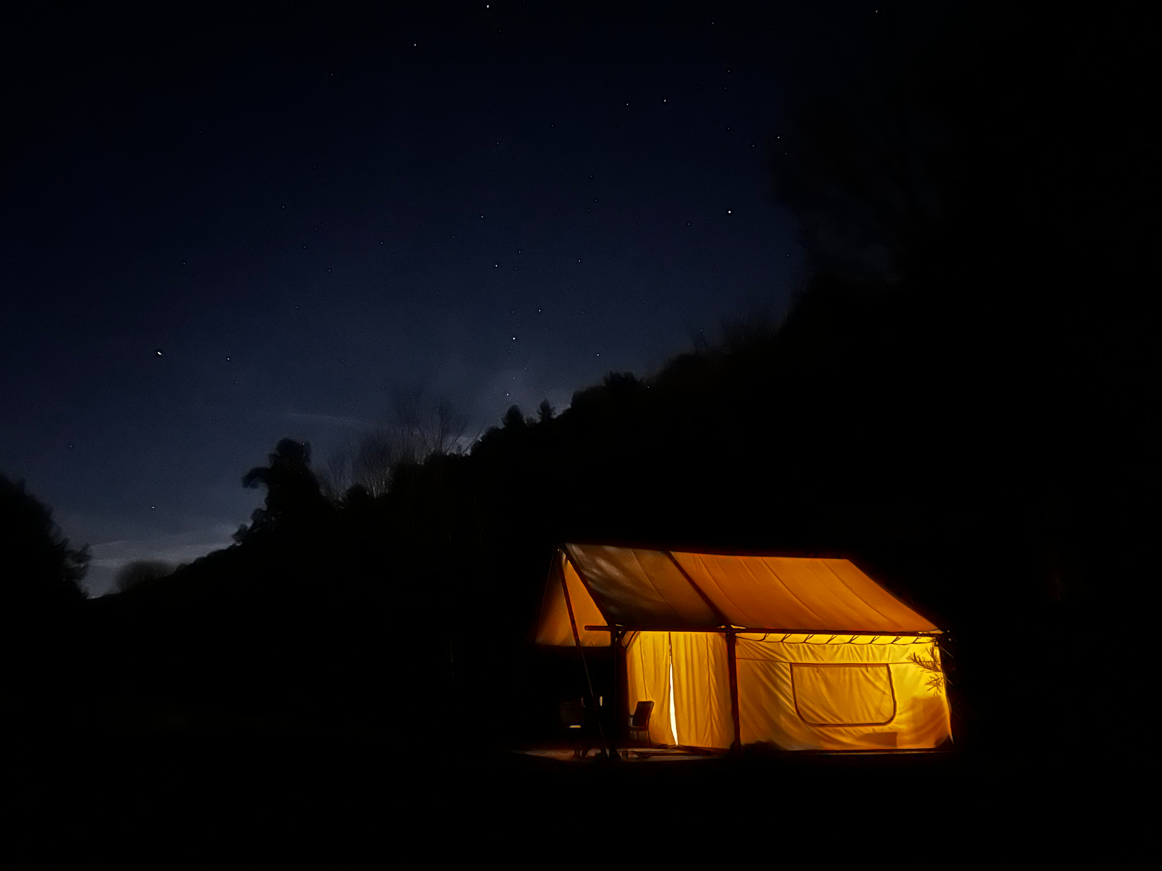 Crest tent under the starry skies. 