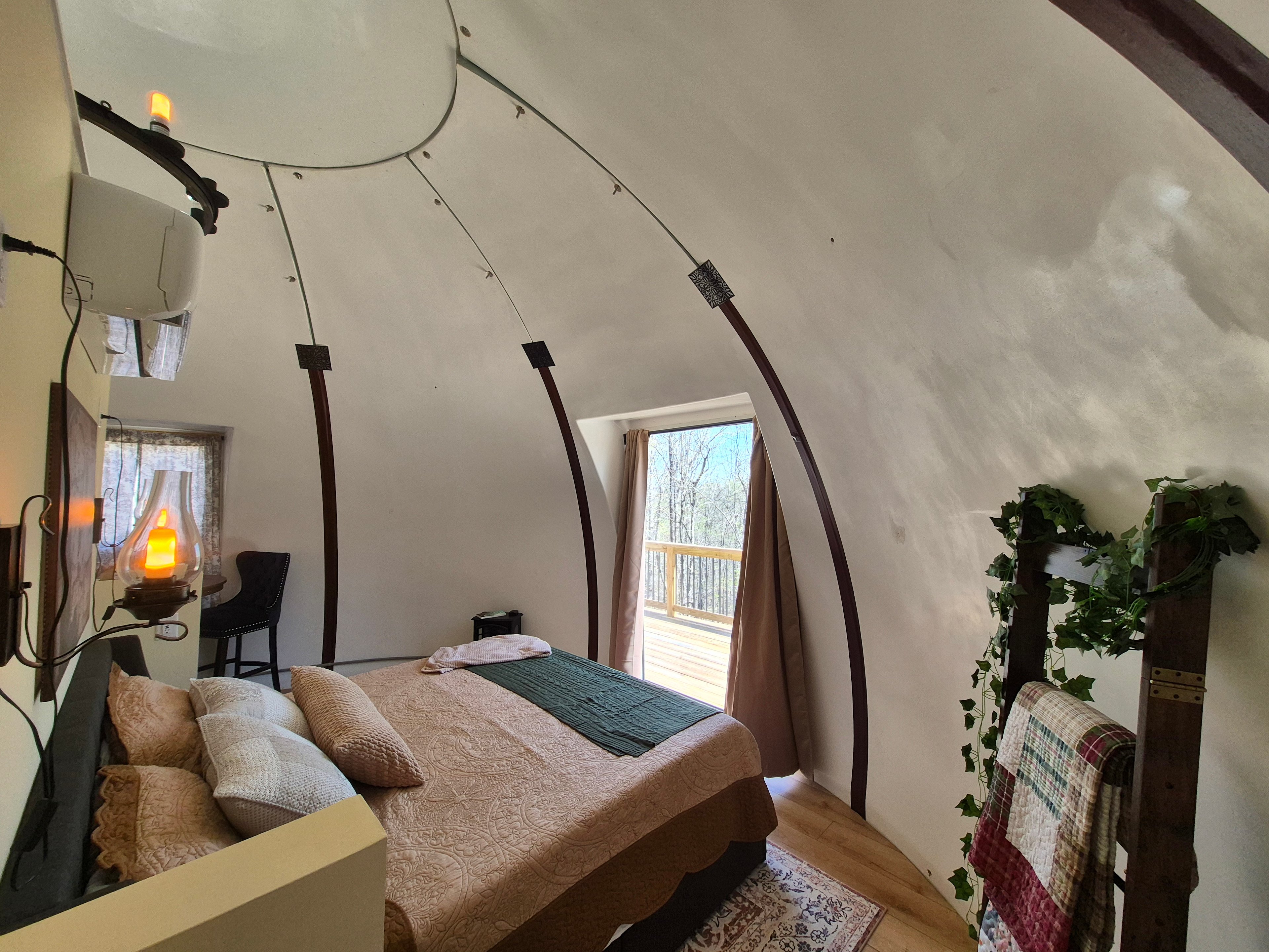 Bag End Retreat with panoramic window for view to the woods outside the dome
