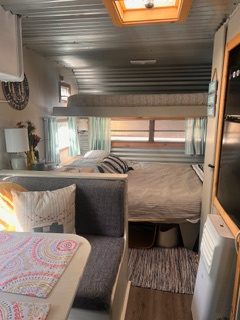 2 small fridges, microwave, hotdog toaster, and coffee maker with toaster oven. 1 Full side bed and a fold down single. 