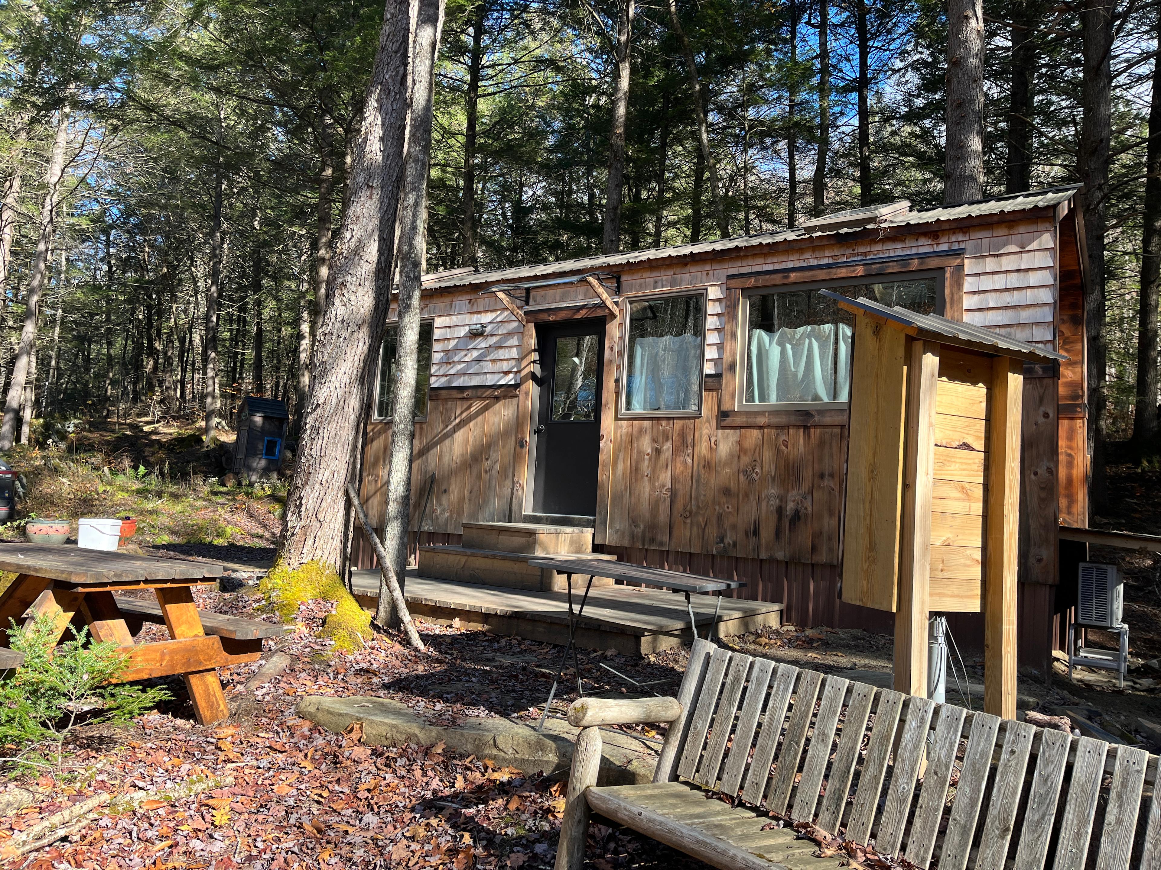 Welcome to VT Tiny Home for Hikers/Bikers!

You can sit near the fire pit to enjoy the forest's presence, watch the birds, and listen to the creek. 

There's easy access to trails--2 trailheads within a few minutes' walk--one to Lilly Pond, a beautiful and pristine nature area, the other connects to 29 miles of Windmill Hill Pinnacle trails system with gorgeous views on the ridge top.

Or, walk to the beaver pond. just up the road. You can see them swimming, building their dams, and making "fwop" sounds as they slap their tails.

Biking, skiing (downhill and X-C), and dining out are nearby options too!


