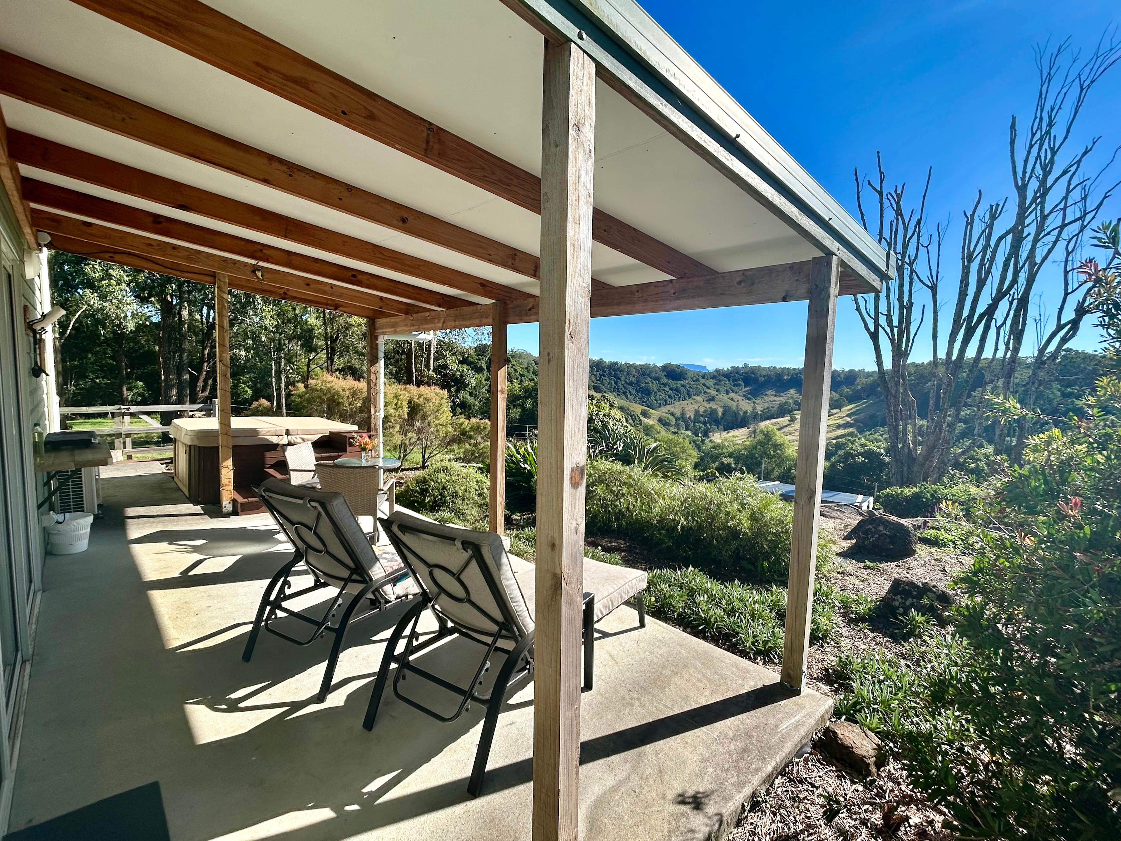 Furnished patio with spa & spectacular private valley views