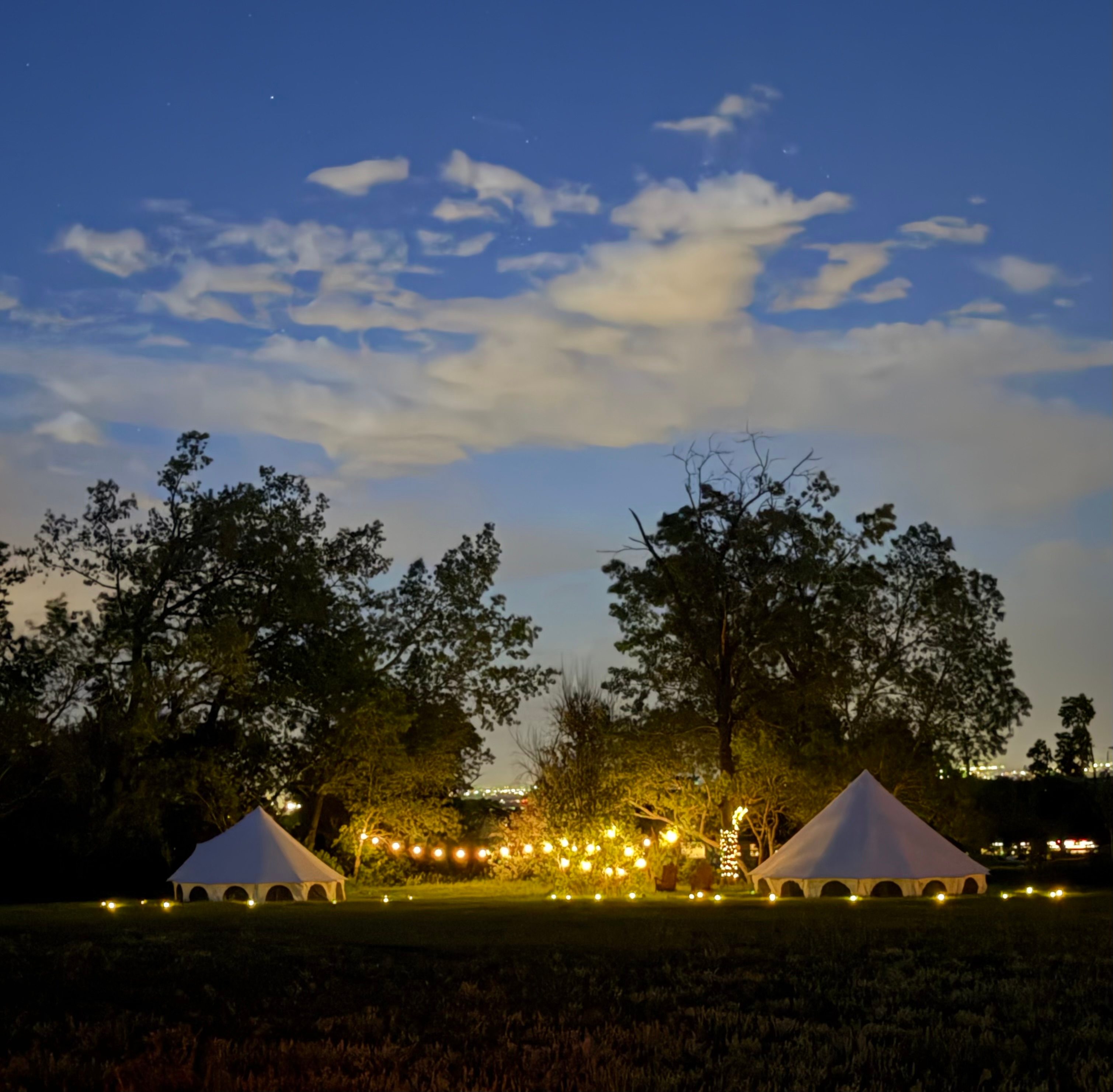 A beautifully lit glampsite for evening delights under the stars.