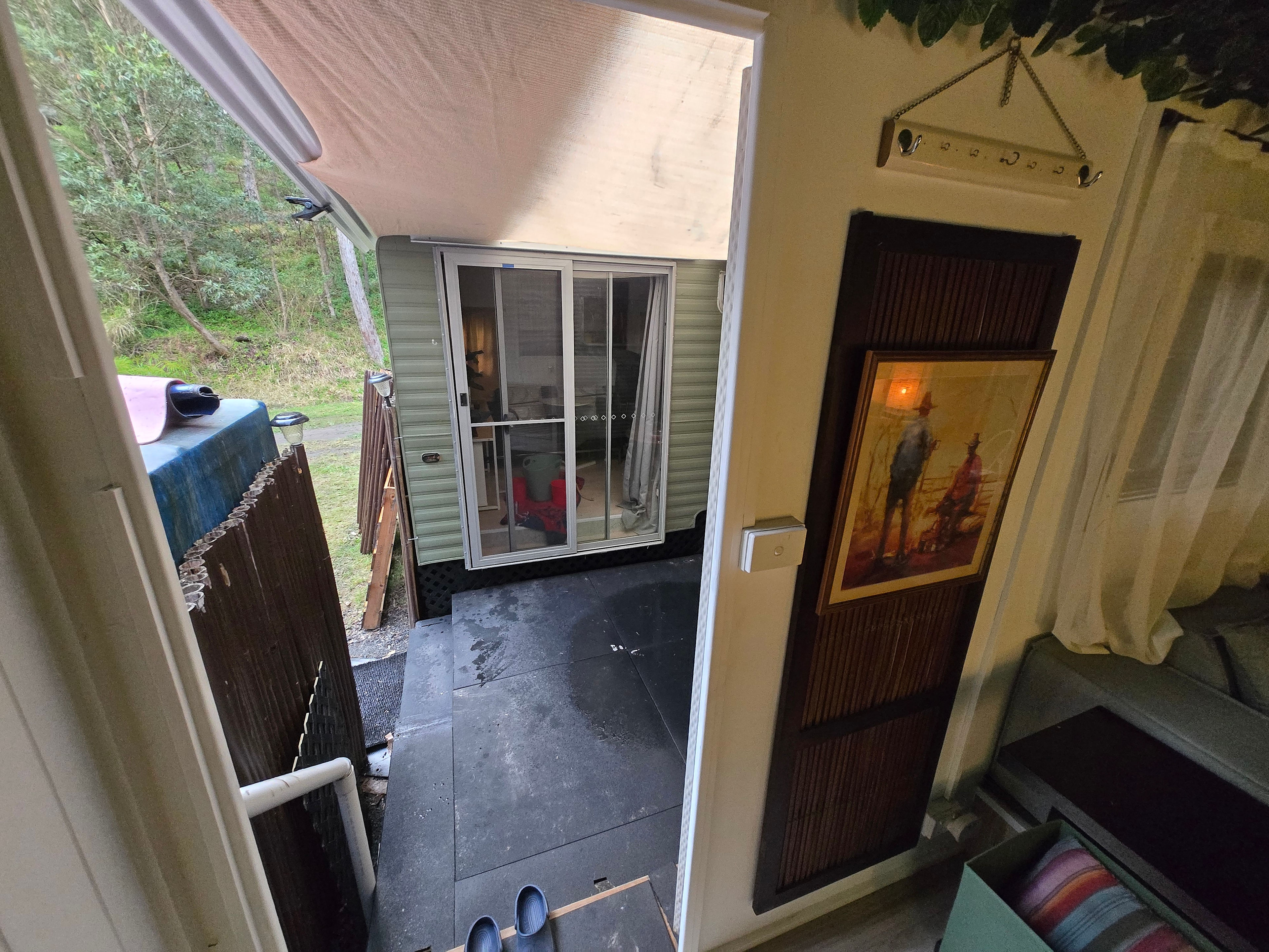 Outside courtyard that connects bedroom van to amenities vans