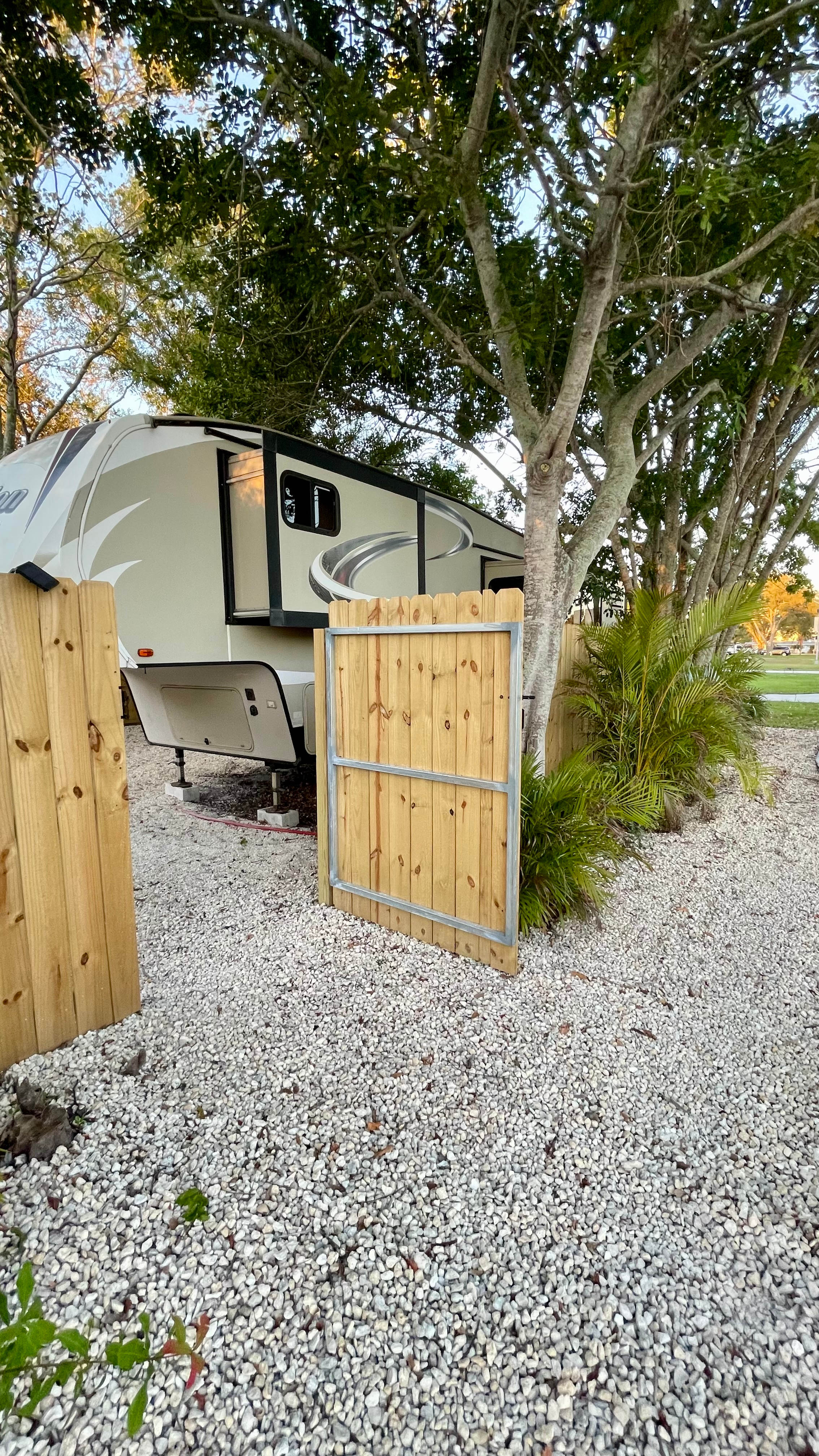 Secluded Shaded RV Oasis: AC, Hot Tub, Hammock & Fire Pit