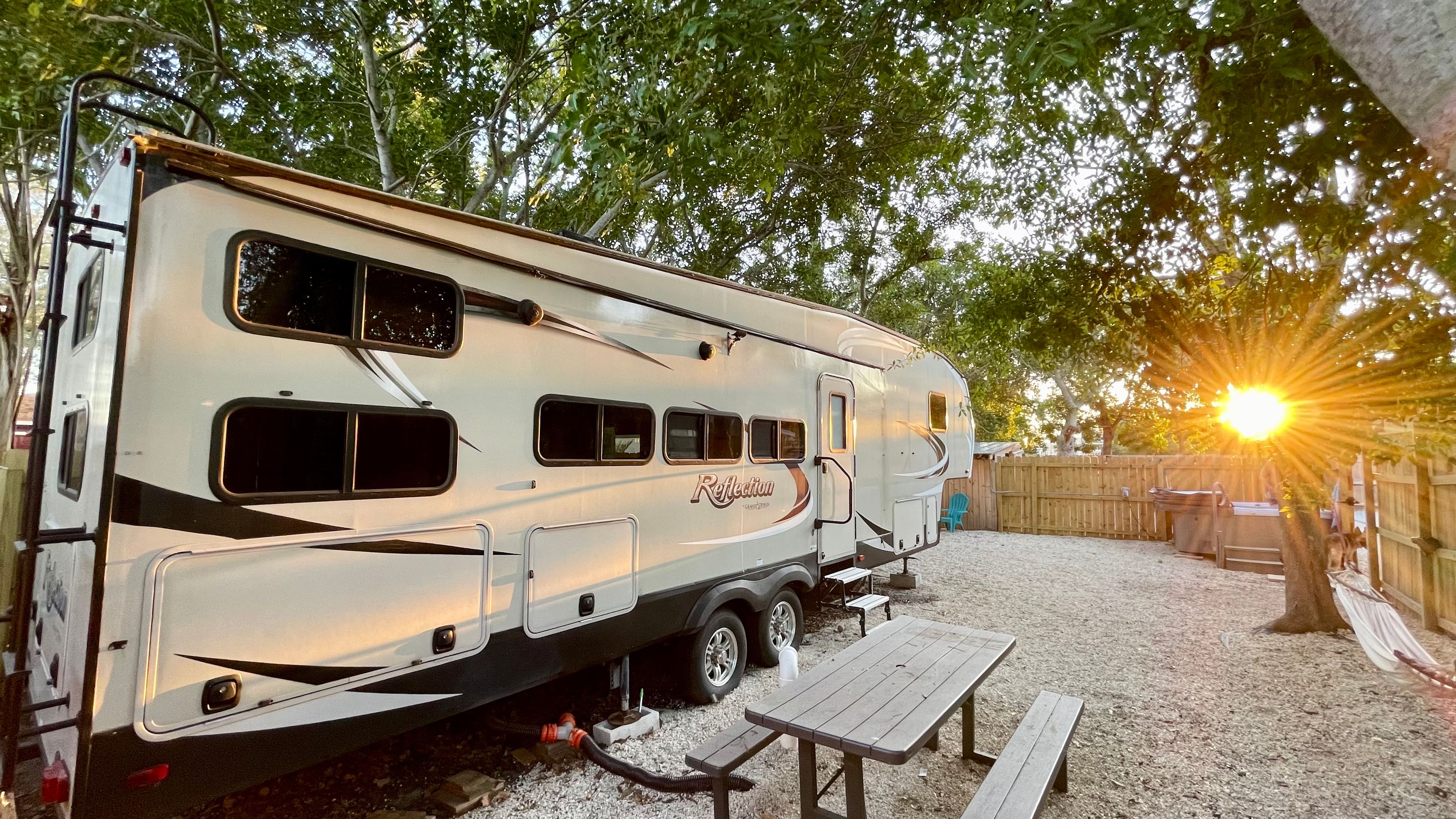 Secluded Shaded RV Oasis: AC, Hot Tub, Hammock & Fire Pit