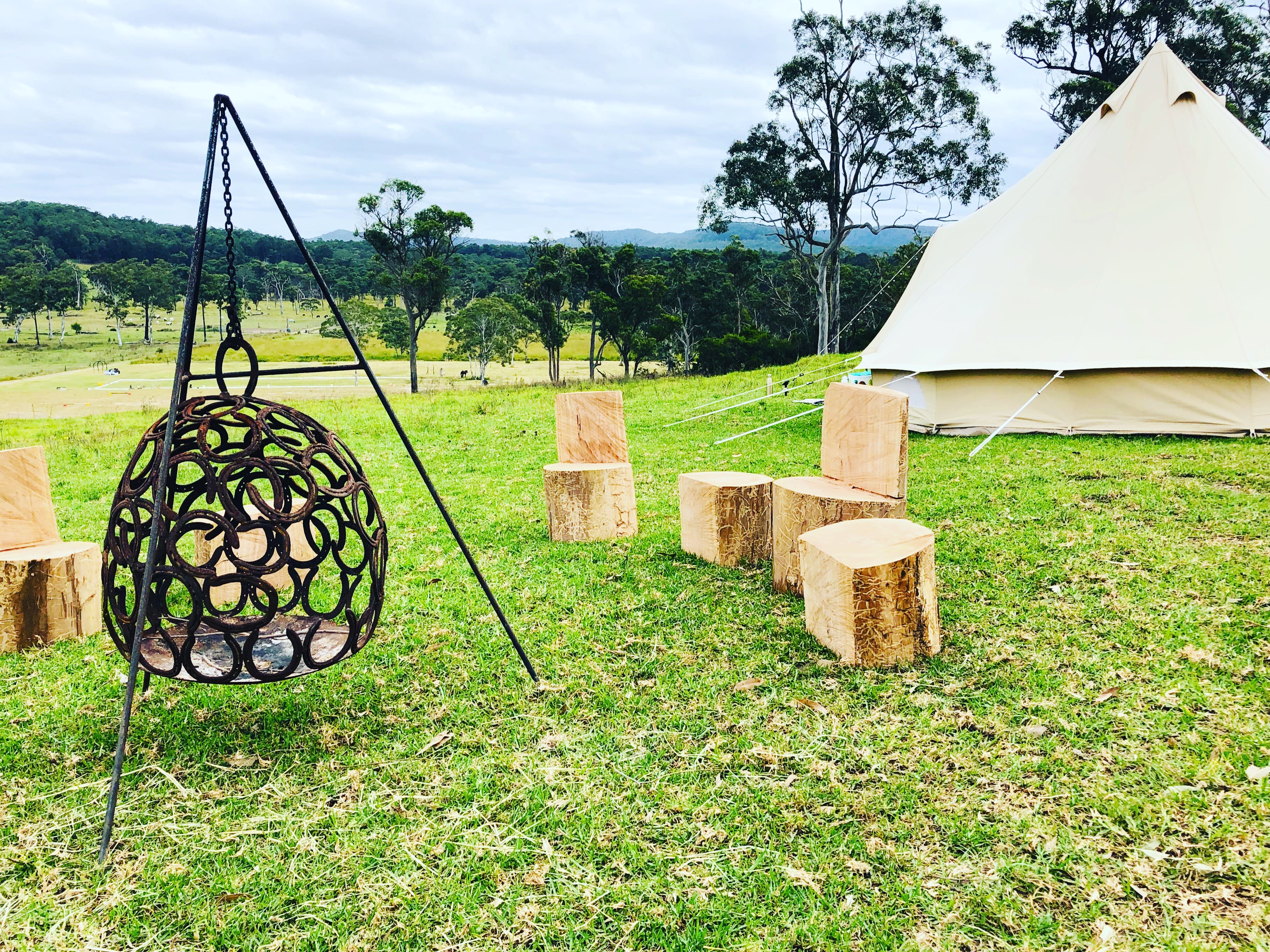 Glamping tents and fire/stools