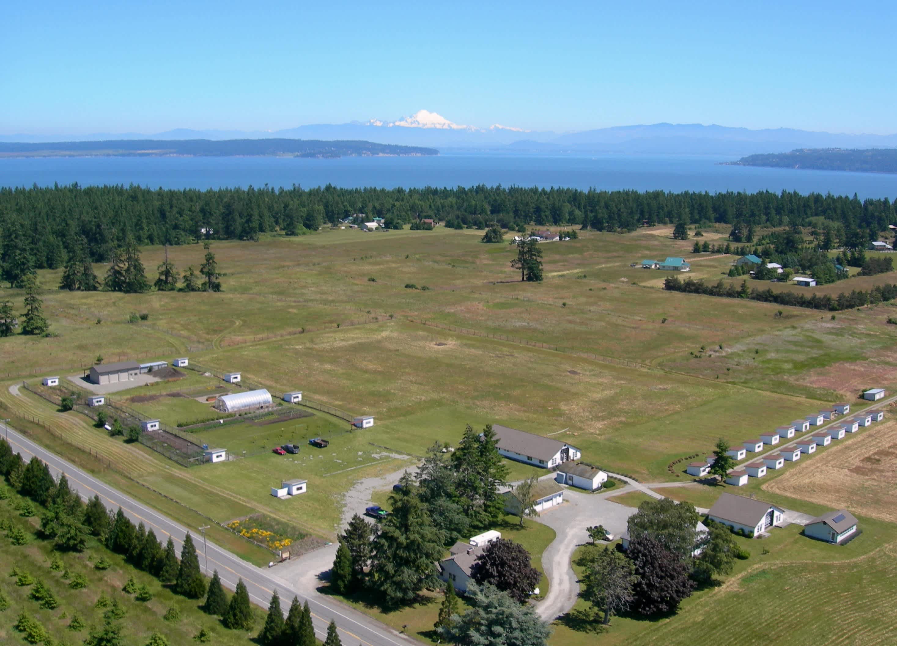 Aerial view of prairie and surrounding forest land
