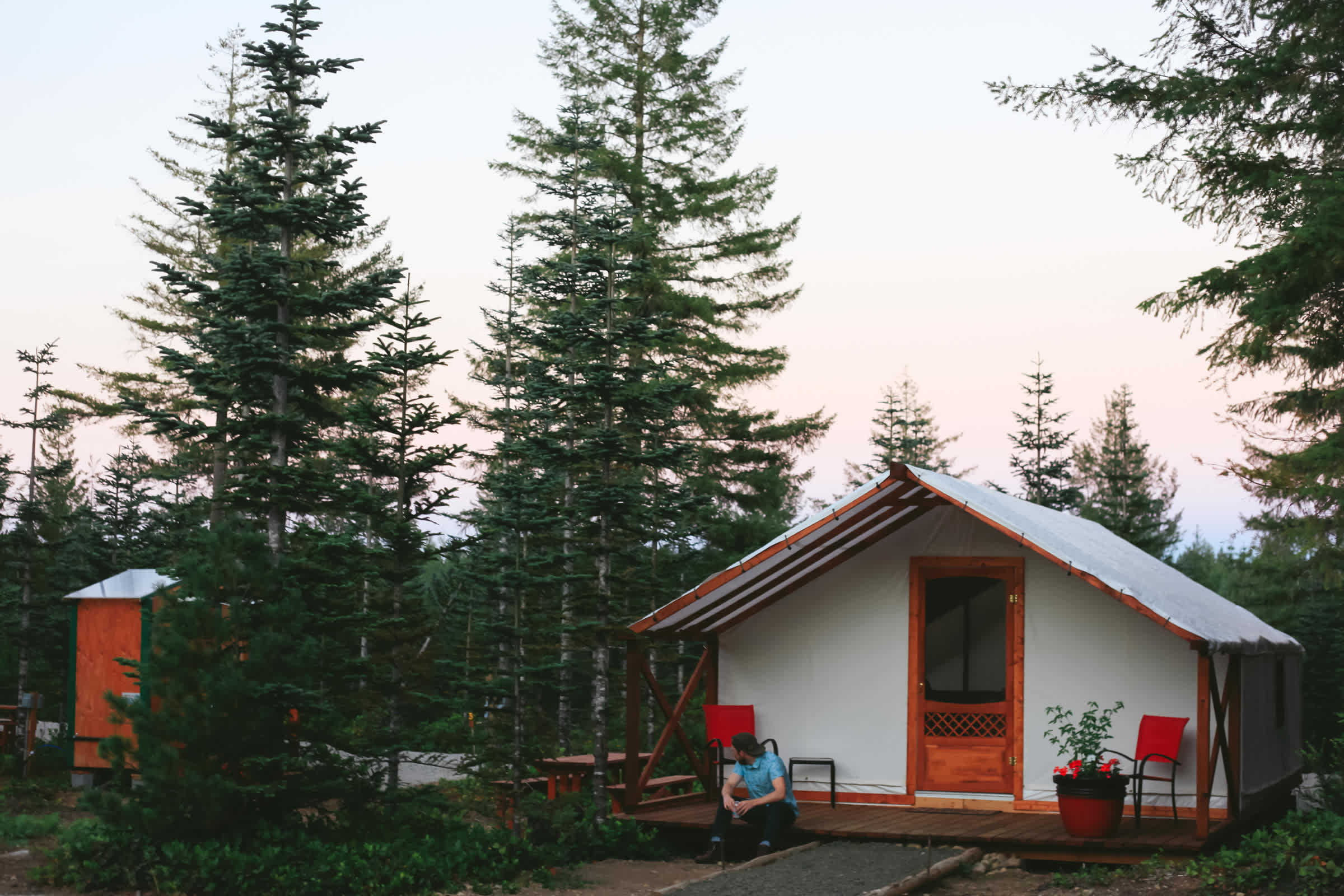 Dusk in August looking East over Cabin 1. The bathroom is near by and the scene is peaceful and easy :)