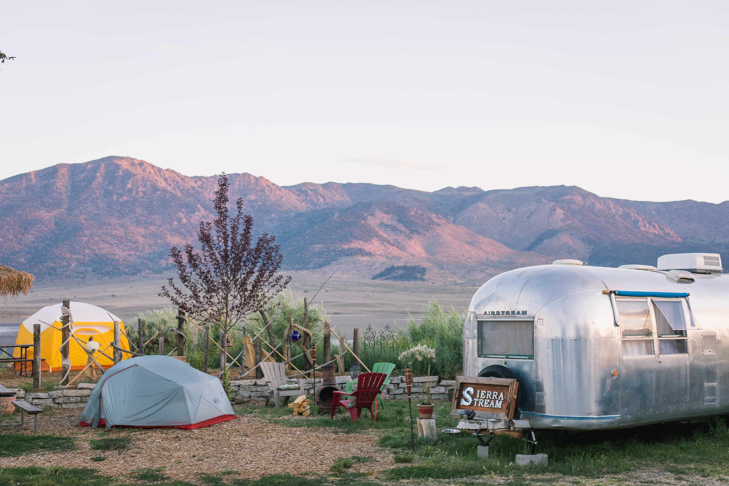 The airstream is perched at the front of the property (my tent is the grey one, the yellow one is another camper's site.) You can park right beside.