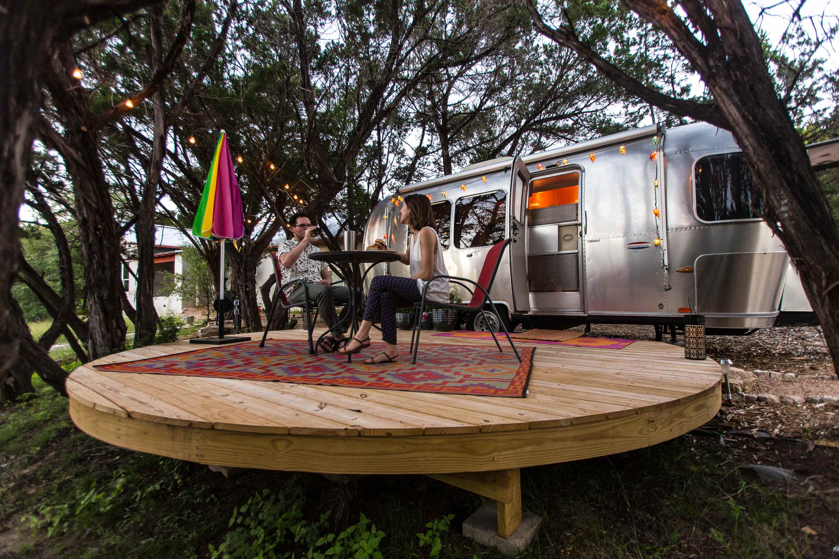 Enjoying dinner on the private platform deck outside the airstream.