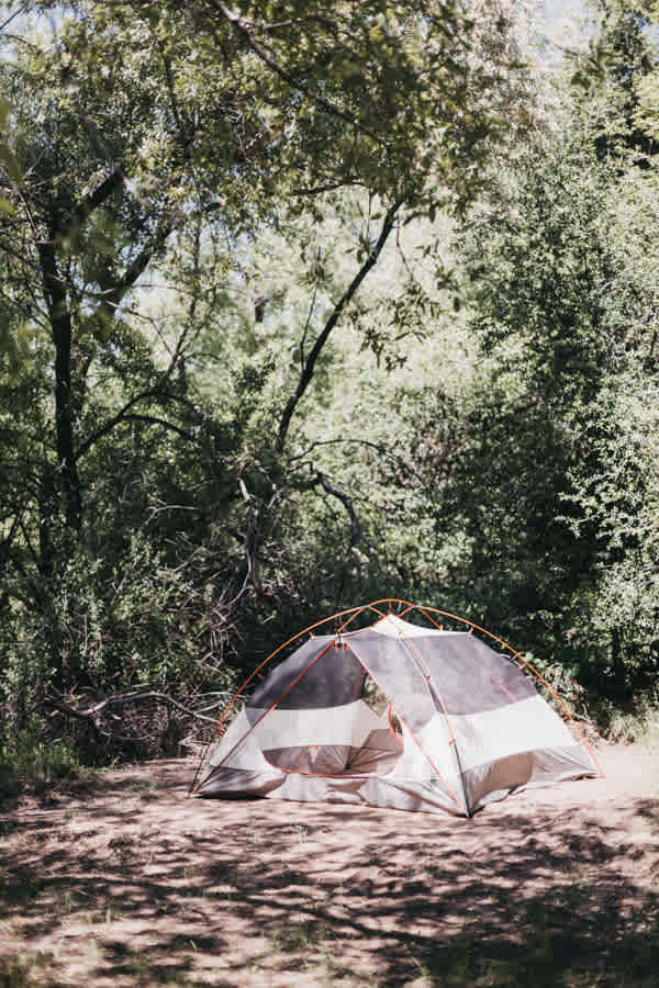 The tent was STEPS away from the most peaceful water