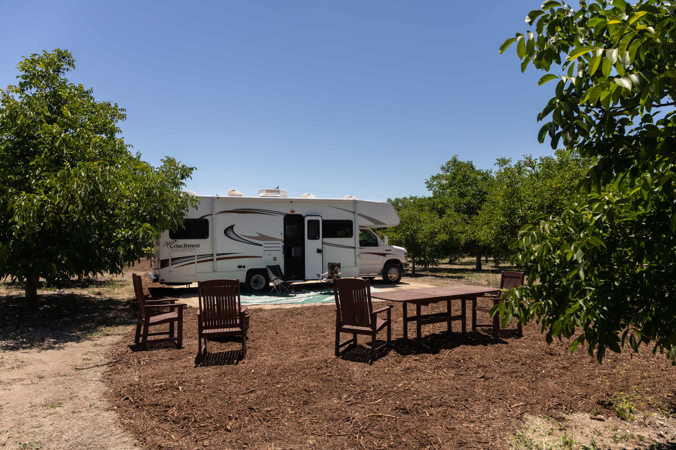Campfire pit, picnic table, and outdoor solar lights add to the ambiance of your secluded getaway. 