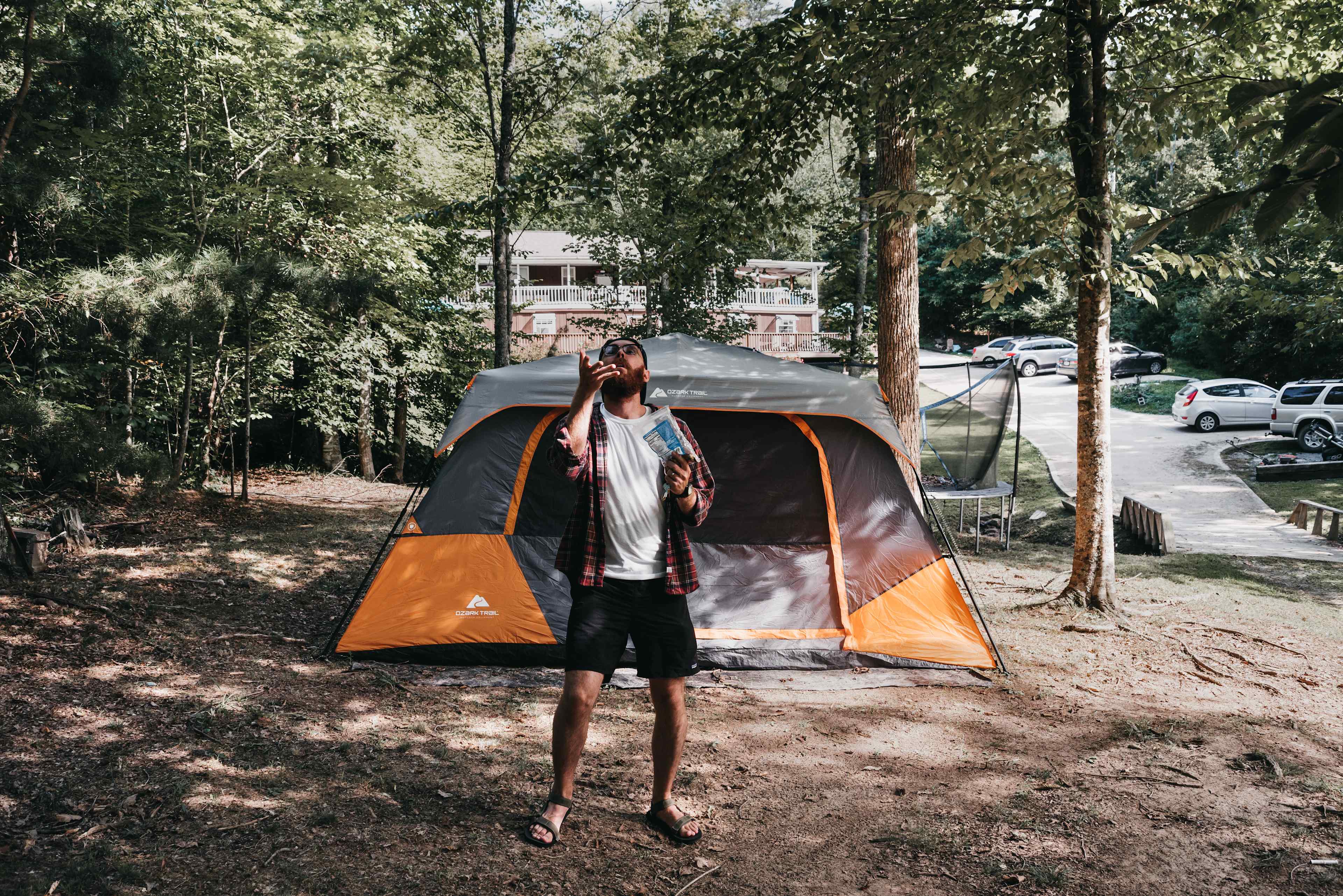 Catching peanuts at one of the tent sites in the trees.