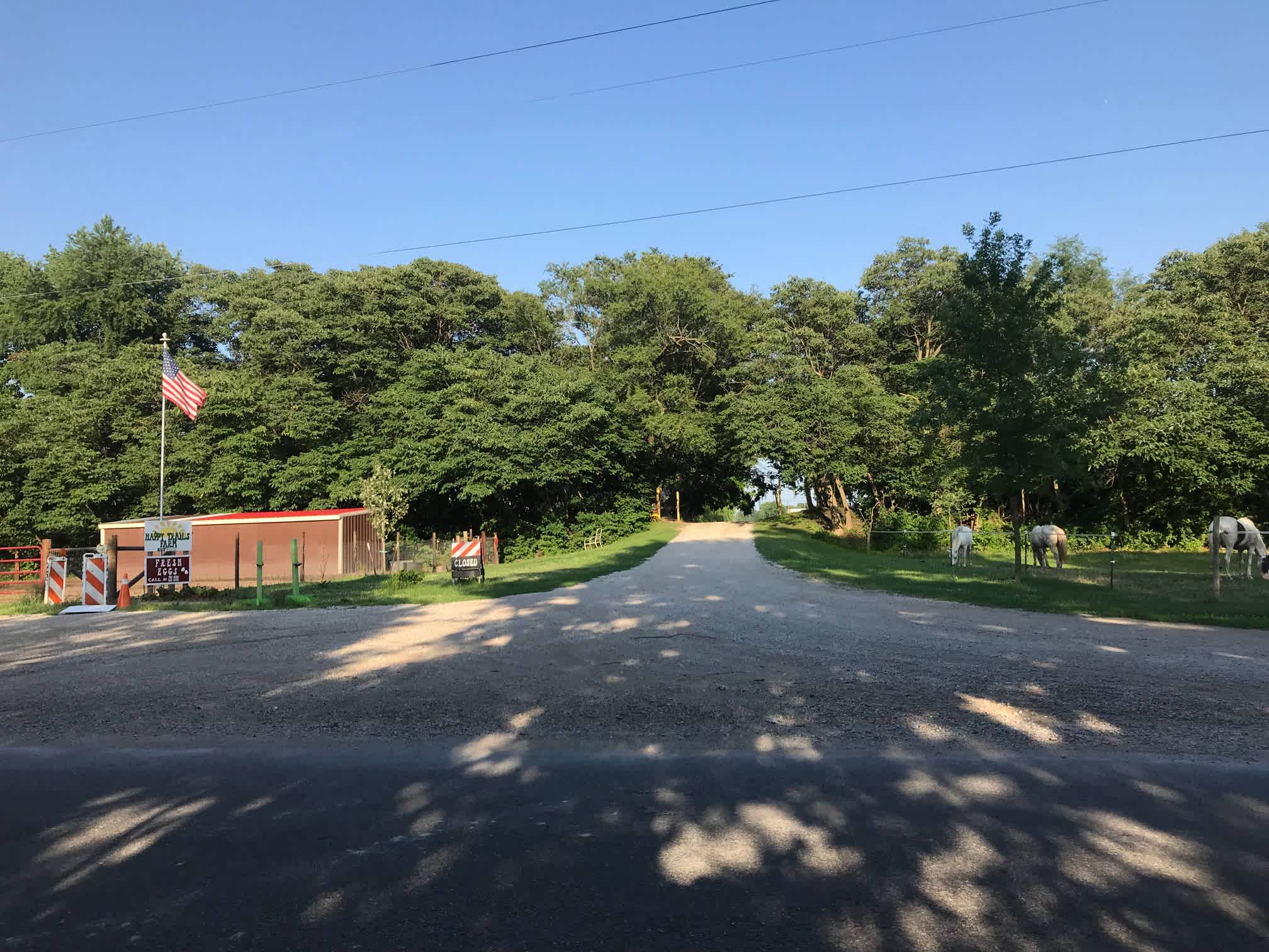 Front Entrance Road view, and graveled parking at pony pen.