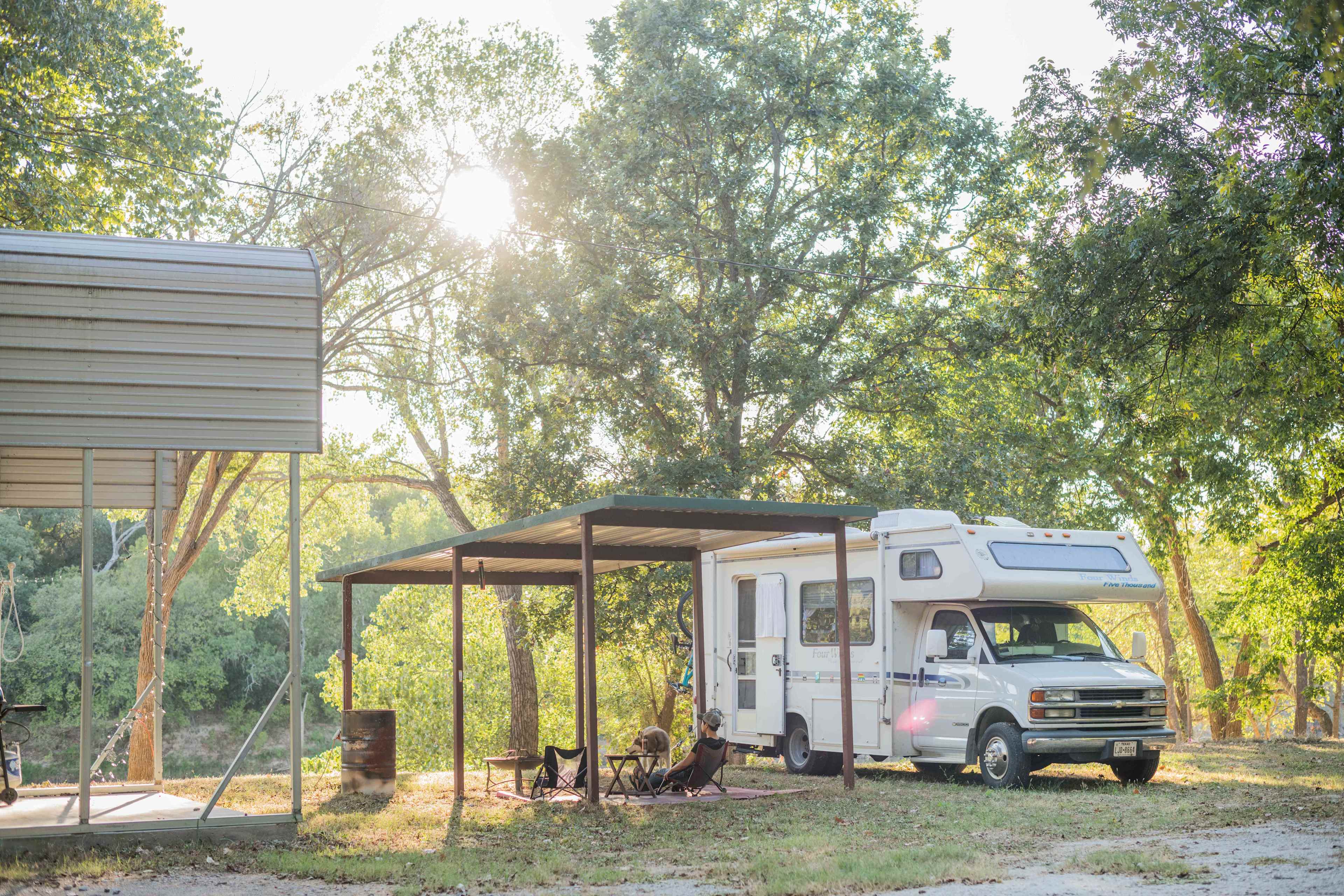 The RV site is level land it was so nice to have a covered picnic pavilion to set up in