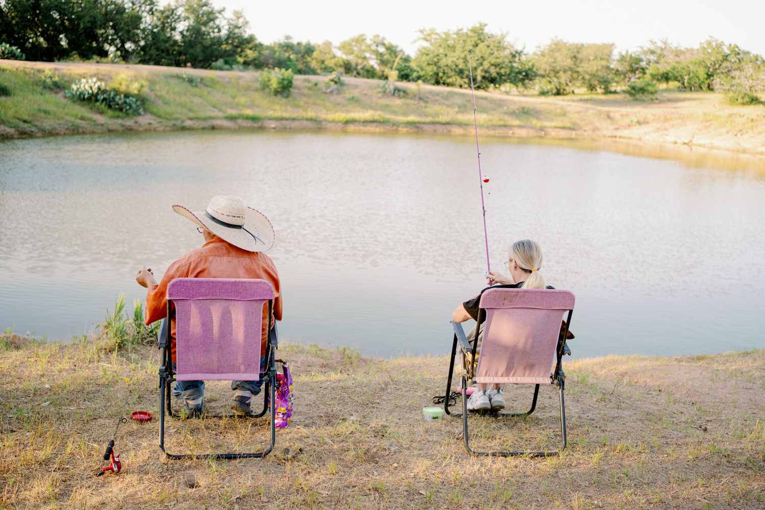Maggi and her friend fishing in the pond
