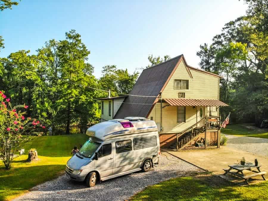 Street view; campsite has  water view and access.  Grassy area for children to roam. It has a 30 & 50 amp electric option.