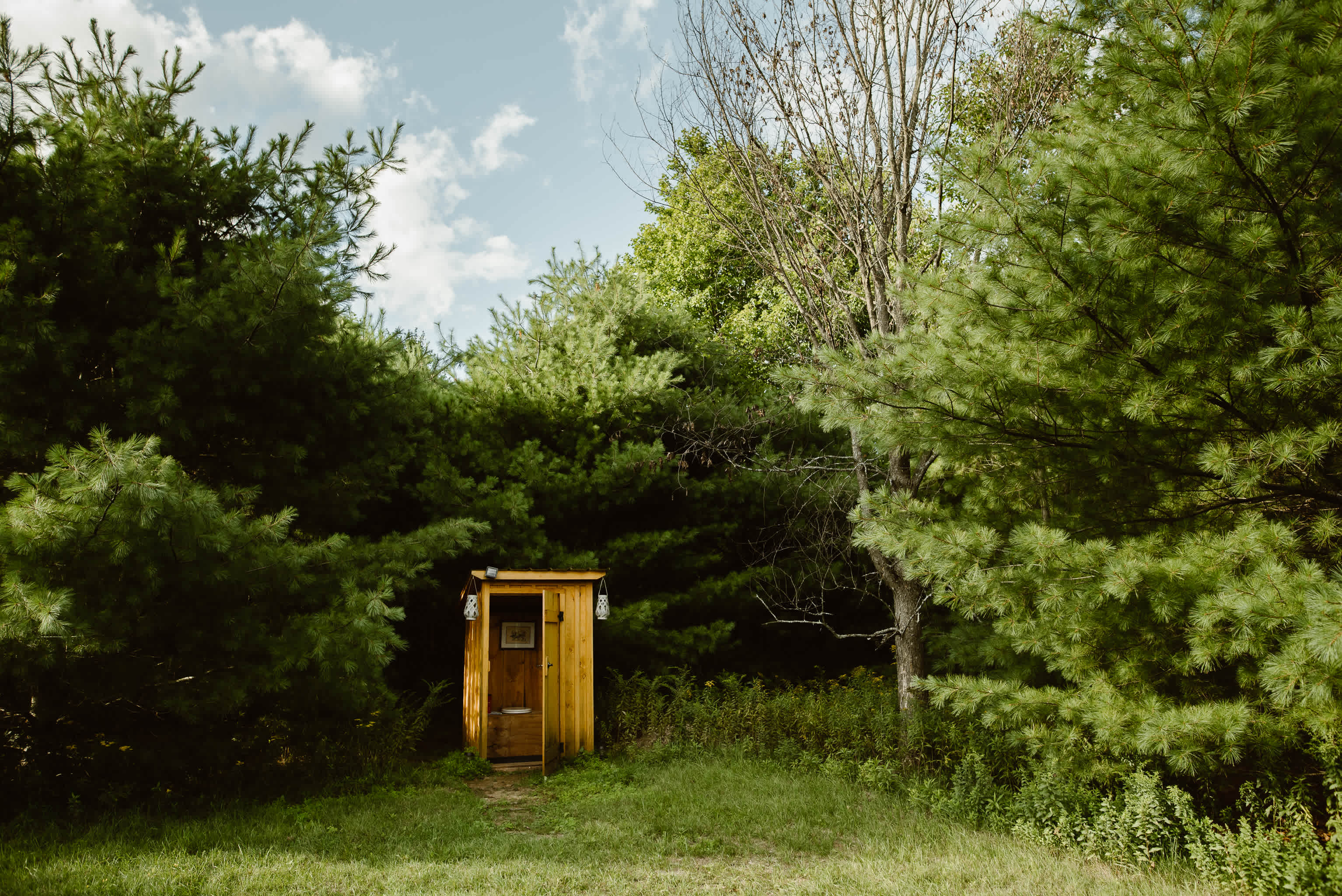 Each campsite has very clean and well-kept outhouse.
