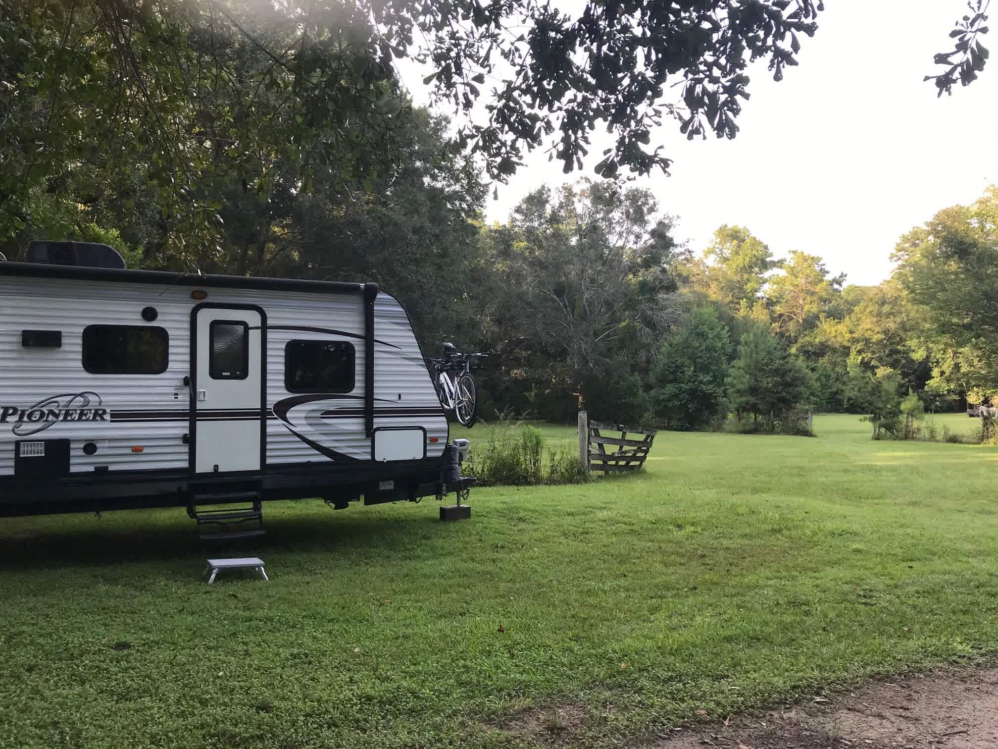 Shaded Site #1.  View when exiting RV is of neighboring pasture and woods.