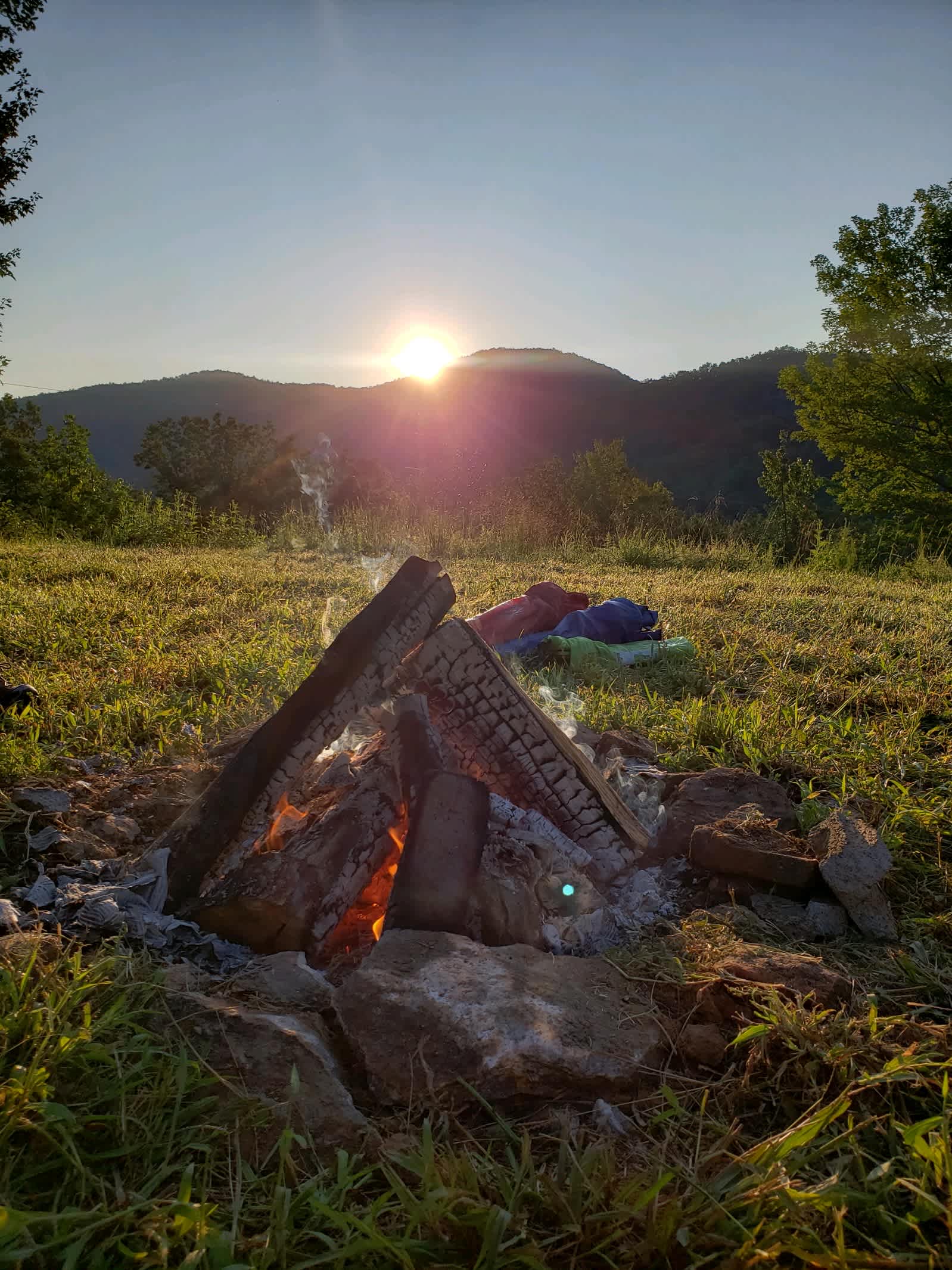 Campfire watching the sunrise at Campsite B.
