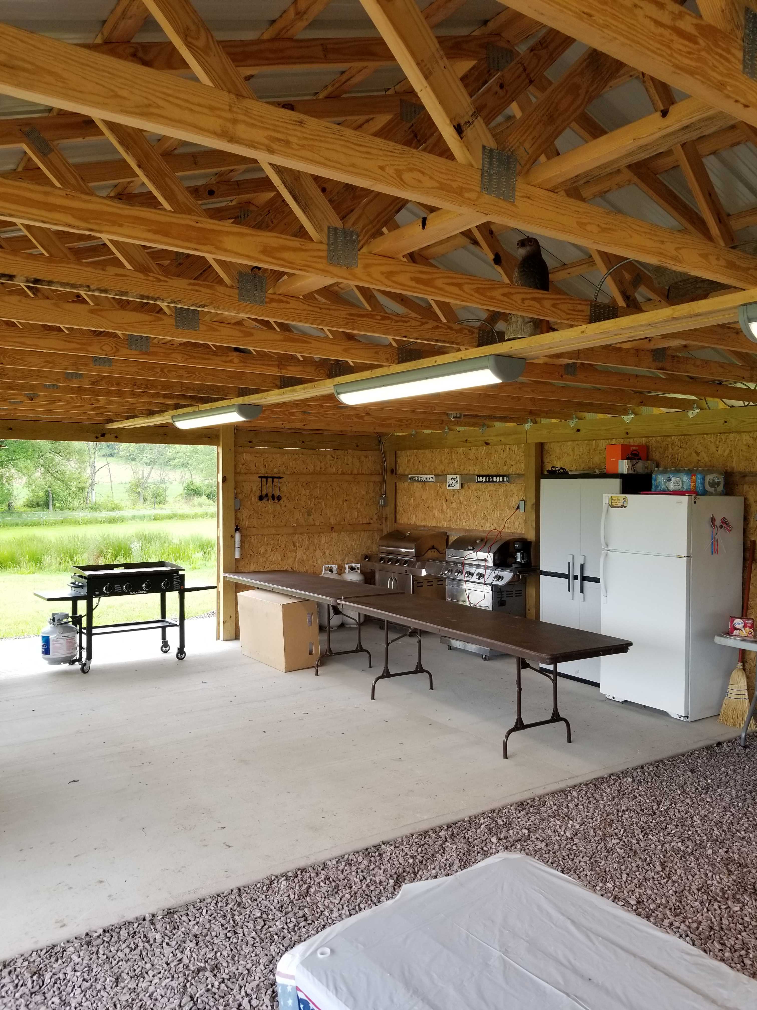 2 propane grills, flat top propane griddle, communal refrigerator
