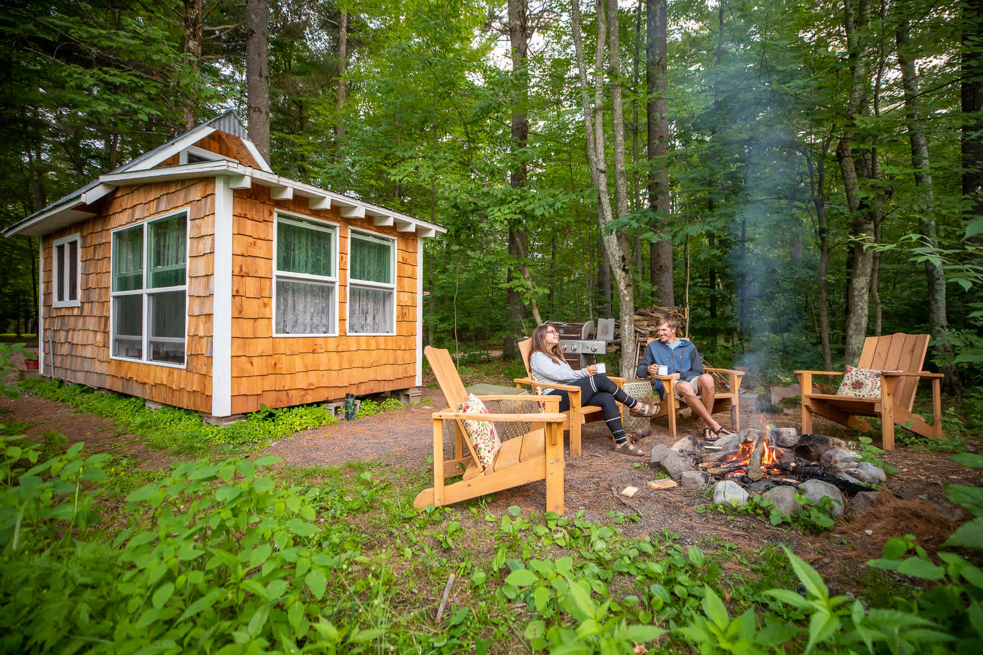 Campfire area in the back located next to one of the smaller ponds