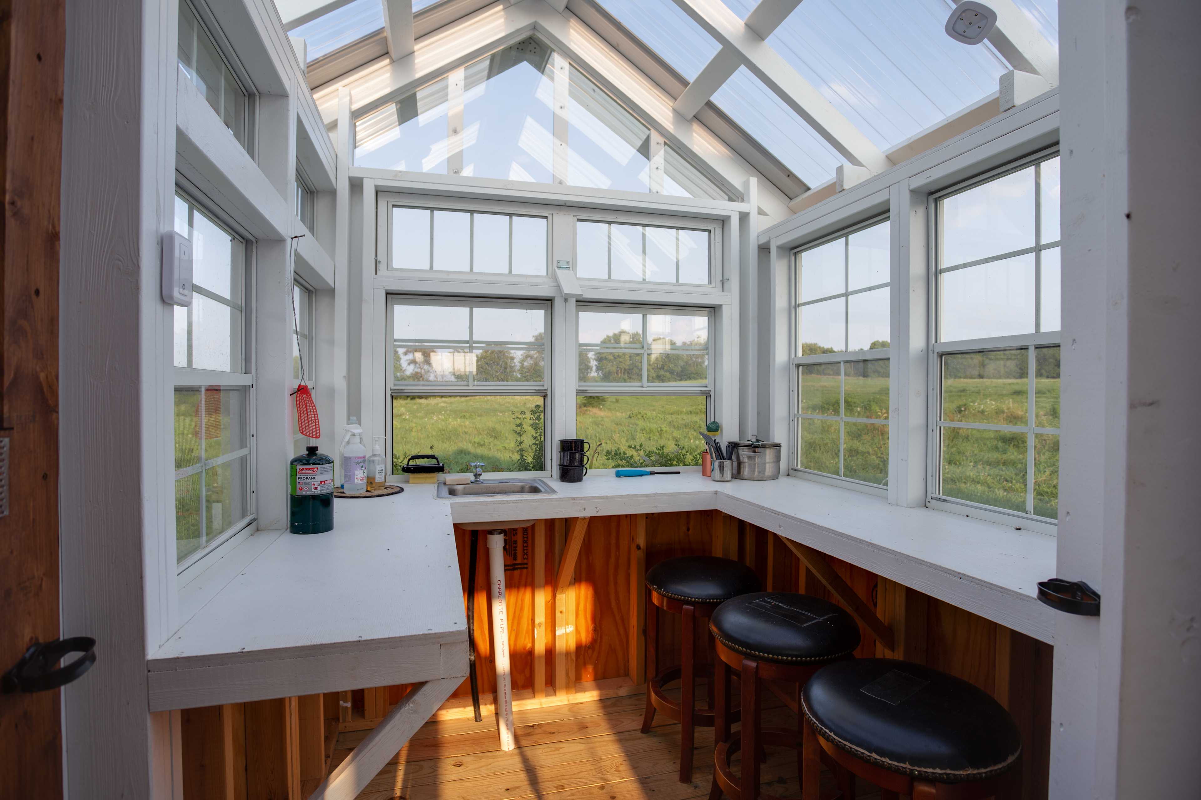 The kitchen area has great windows and skylights