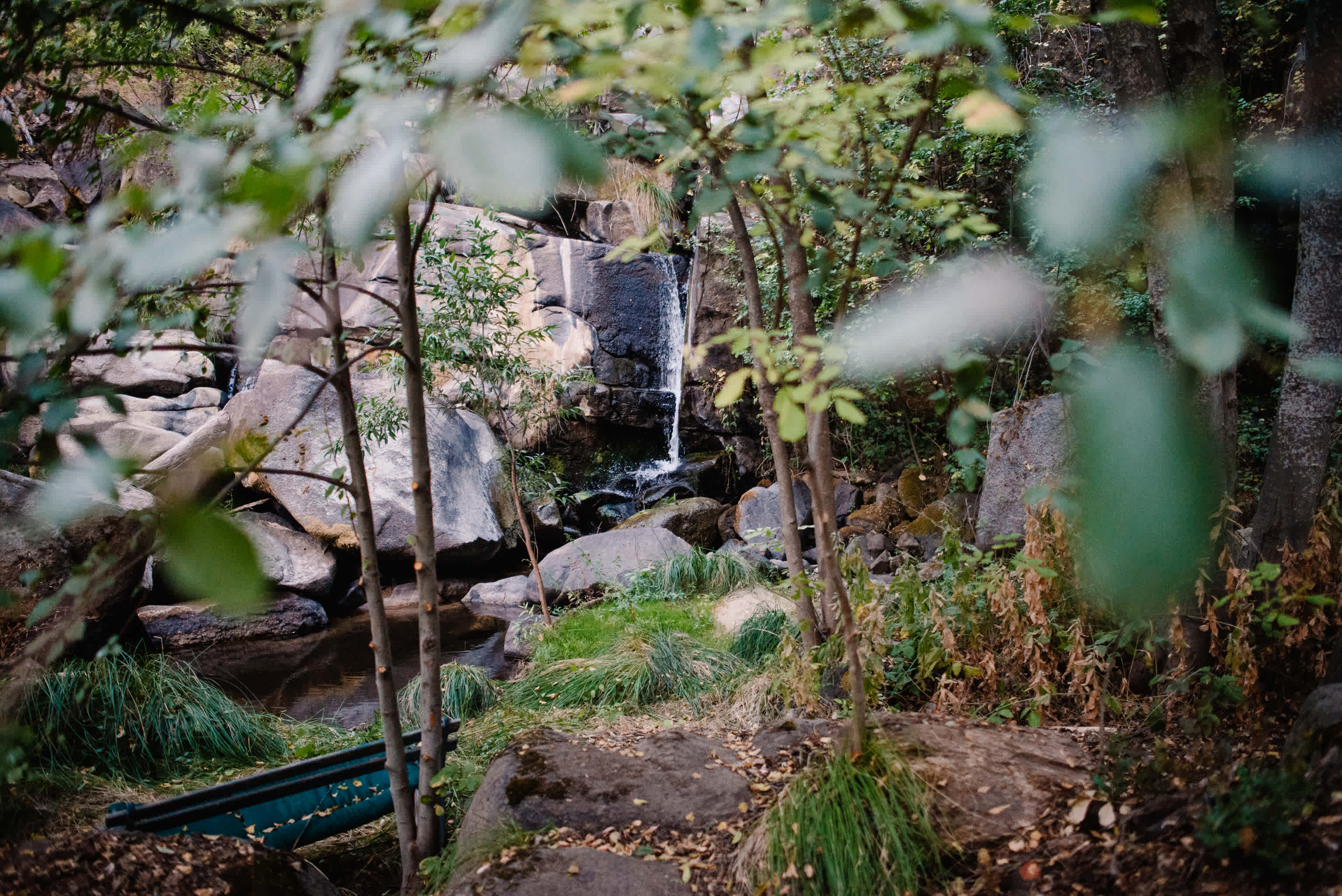 One of the falls with a bench