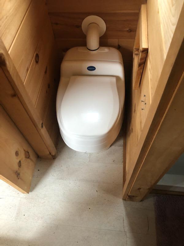 Toilet - potty drains to french drain and solid waste is bagged for camper disposal